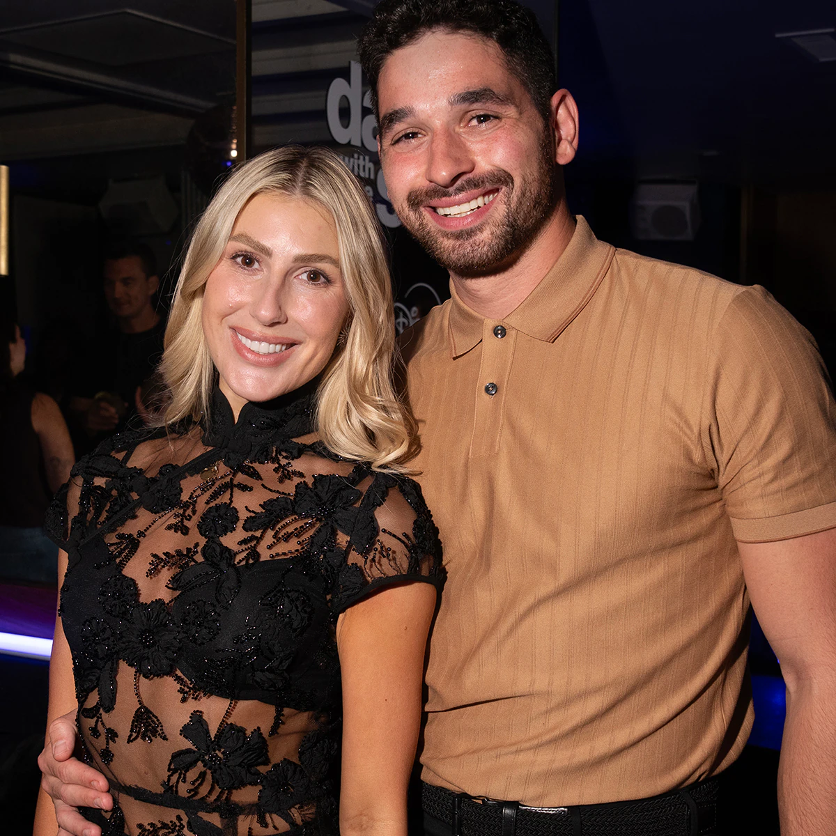 Emma Slater and Alan Bersten posing together