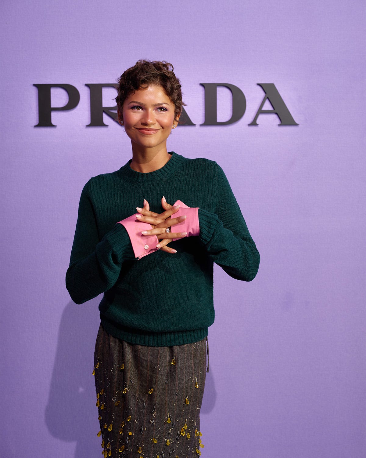 Zendaya posing on a fashion red carpet