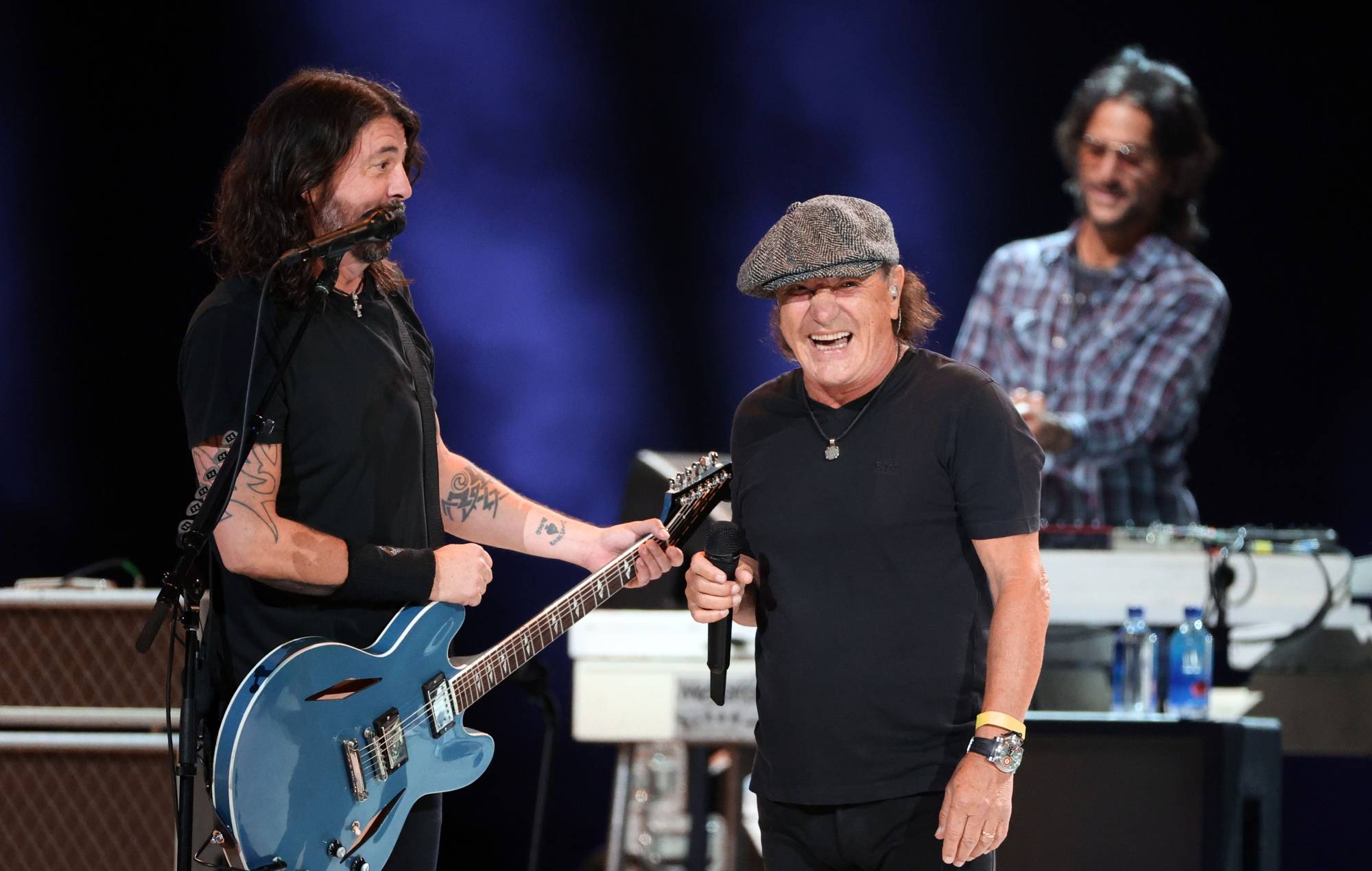 Dave Grohl performing live on stage with Foo Fighters