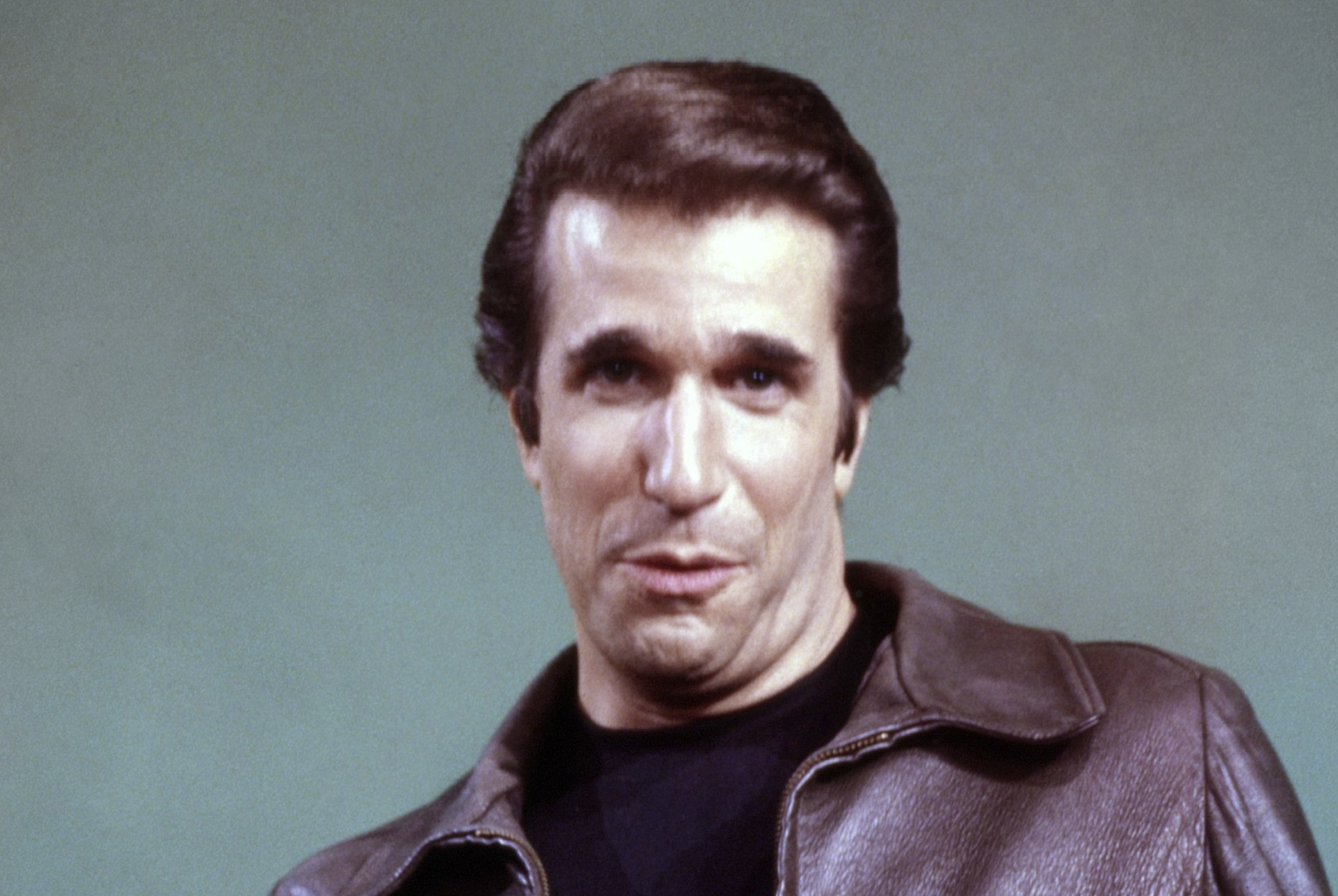 Henry Winkler speaking at a television press event