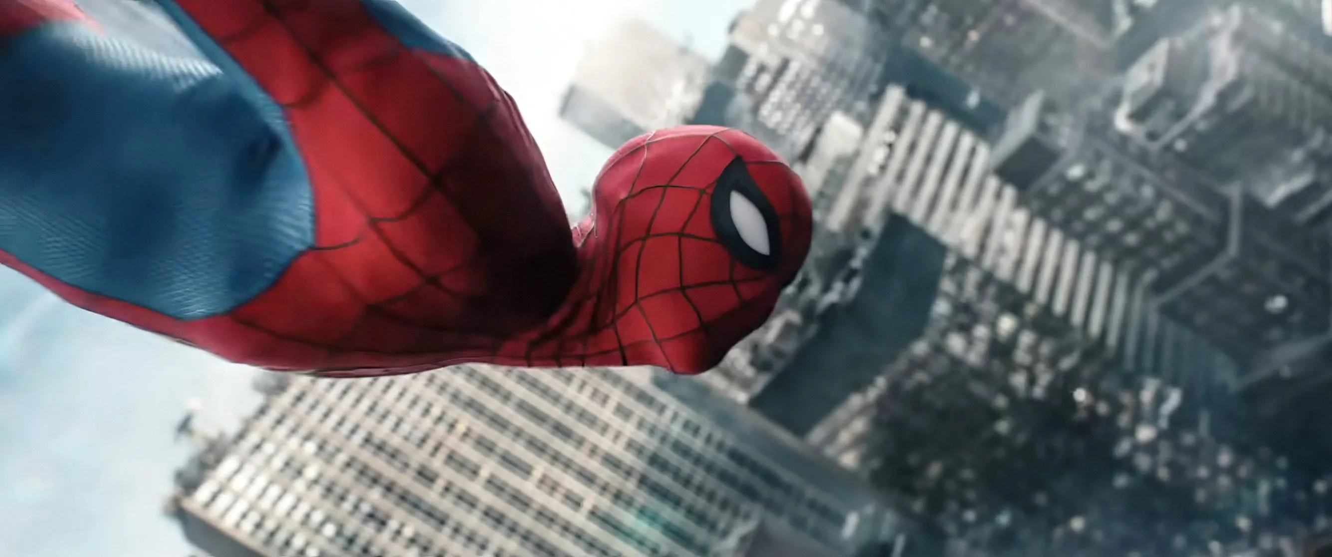 Spider-Man leaping through the air in a movie still