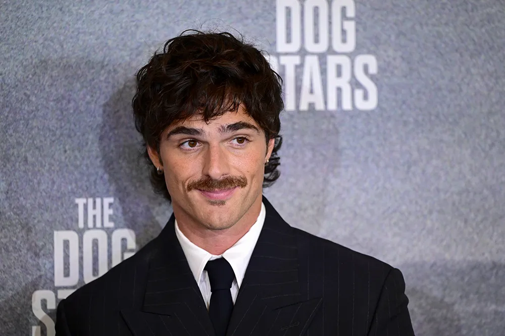 Jacob Elordi smiling on the red carpet at the London premiere of The Dog Stars
