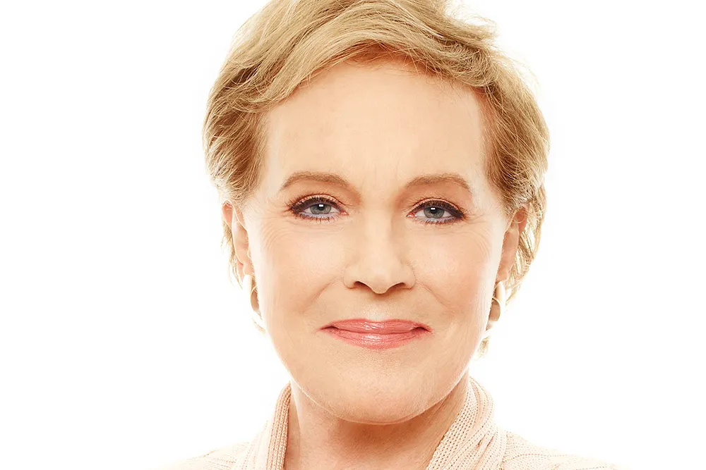 Julie Andrews smiling at a public entertainment event