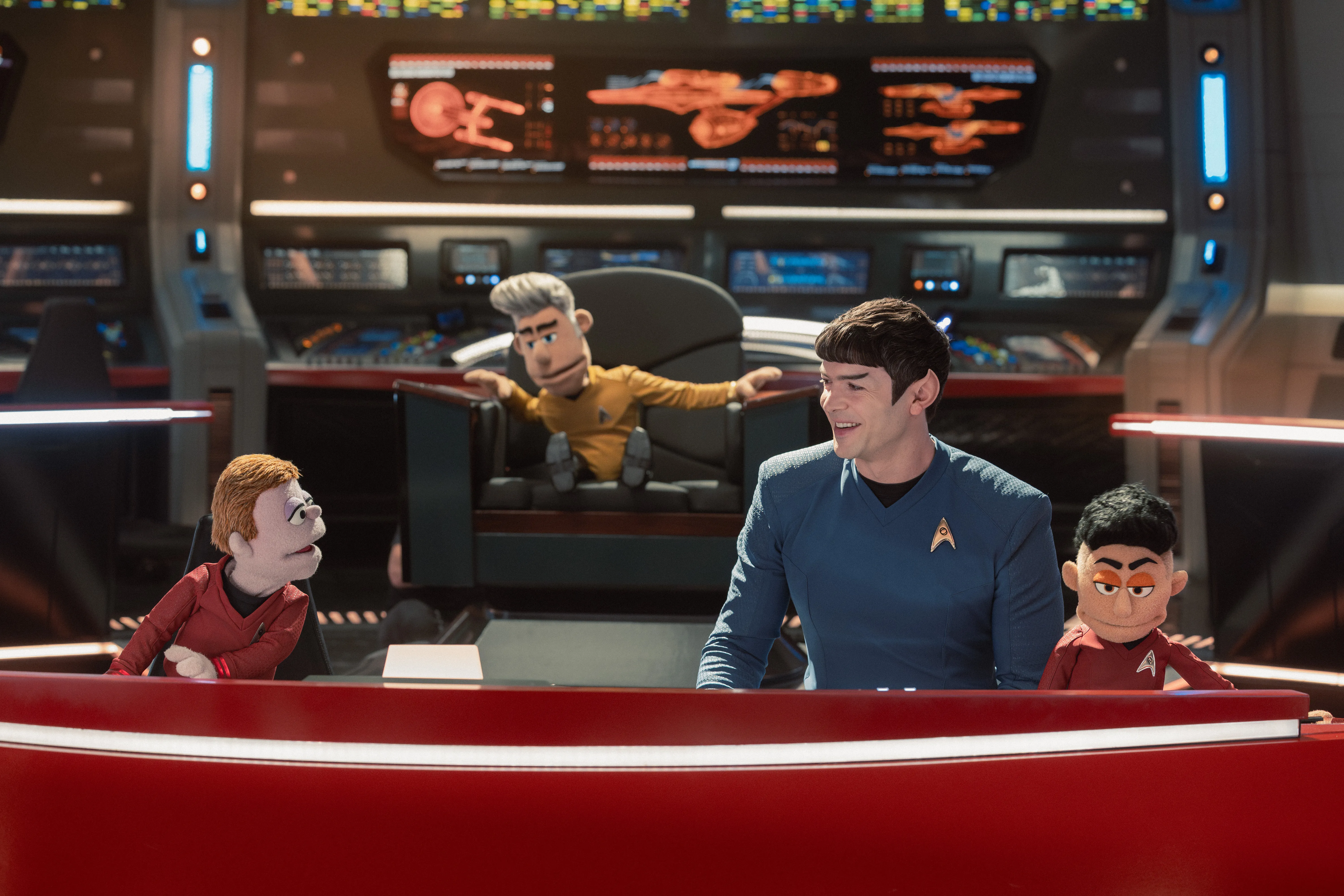 Ethan Peck as Spock with his puppet castmates