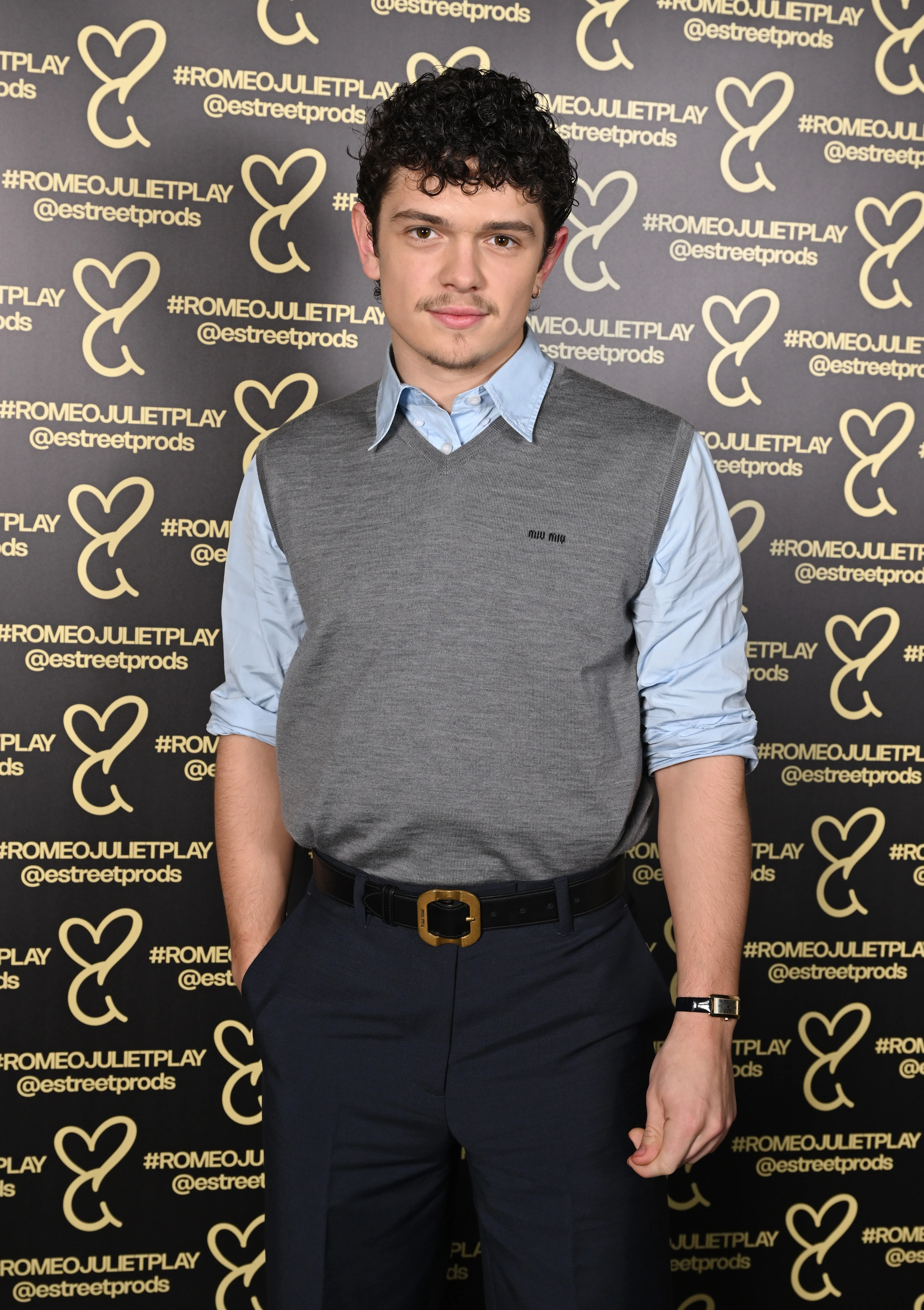 Actor Noah Jupe walking a red carpet at a movie premiere.
