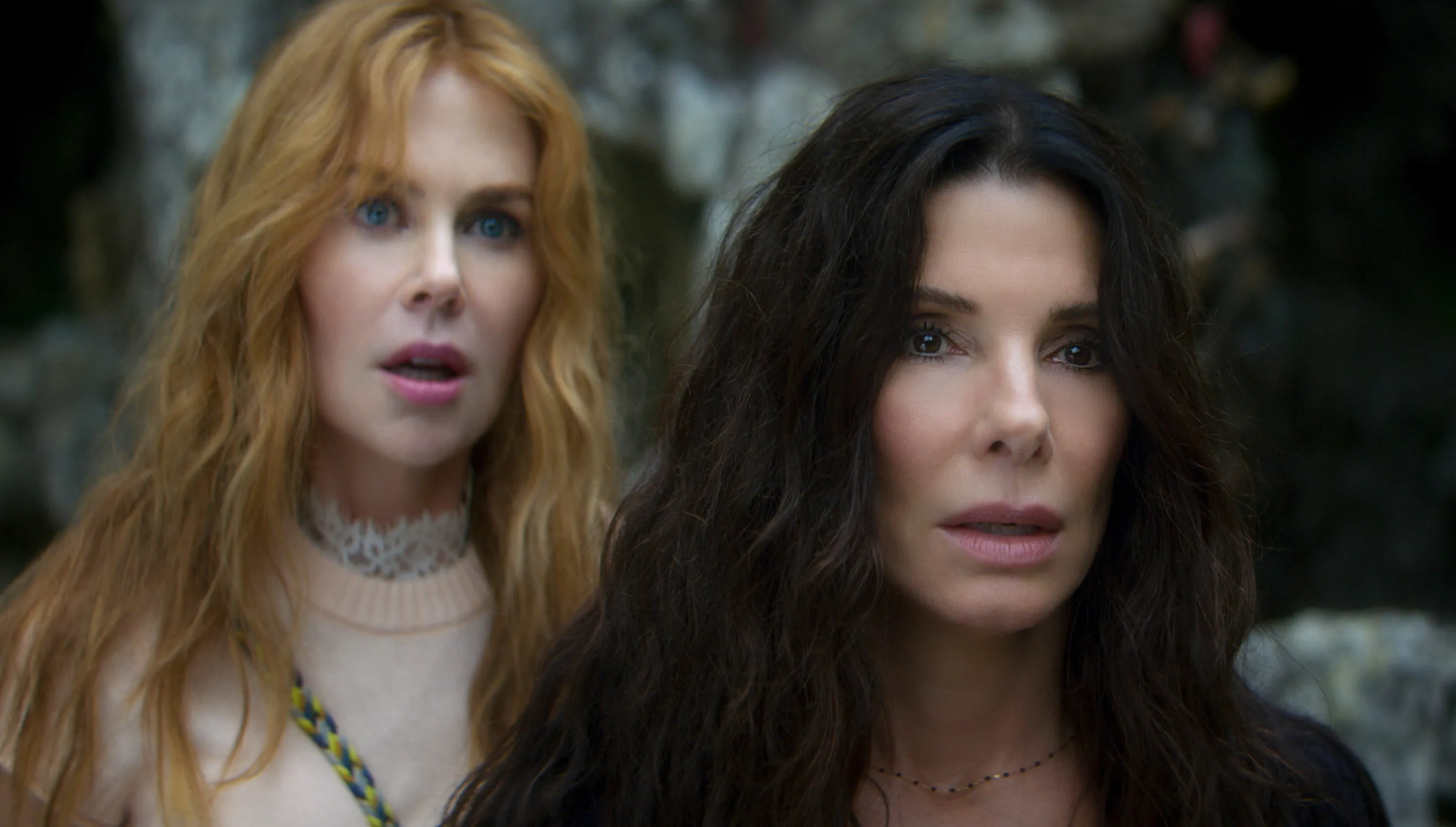 Sandra Bullock and Nicole Kidman posing together at a Hollywood premiere event