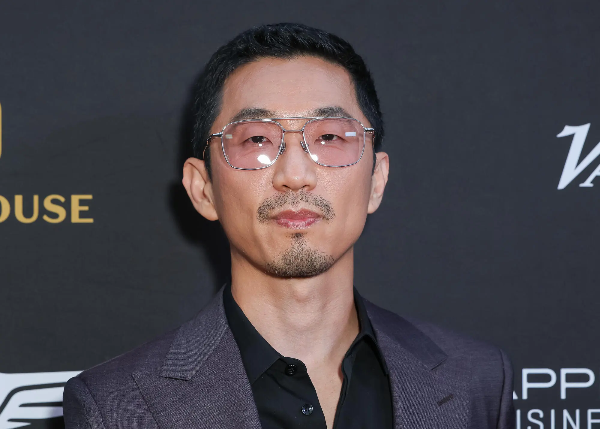 Lee Sung Jin and Charles Melton at an entertainment event