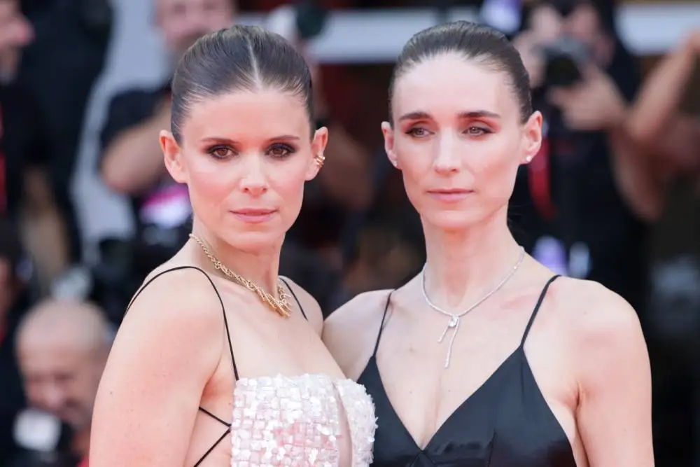Rooney Mara and Kate Mara posing together at a film festival premiere