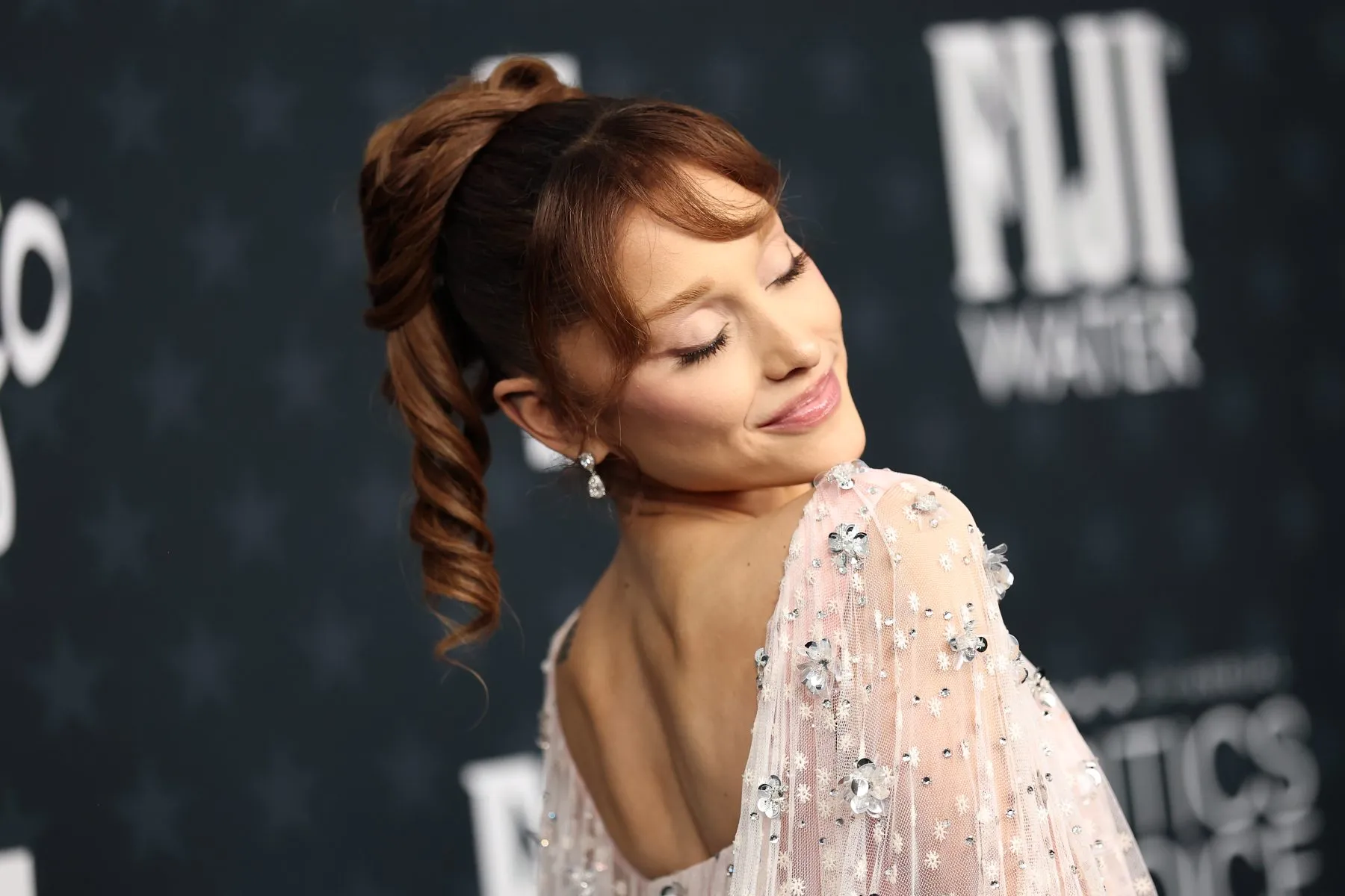 Ariana Grande performing on stage during her Eternal Sunshine Tour finale in London