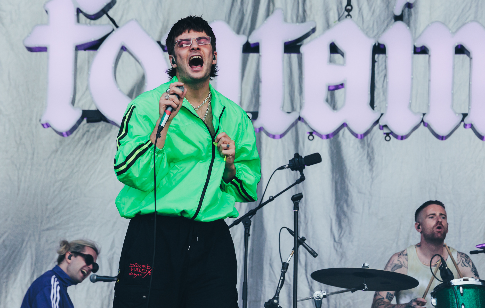Fontaines D.C. performing live on stage under concert lights