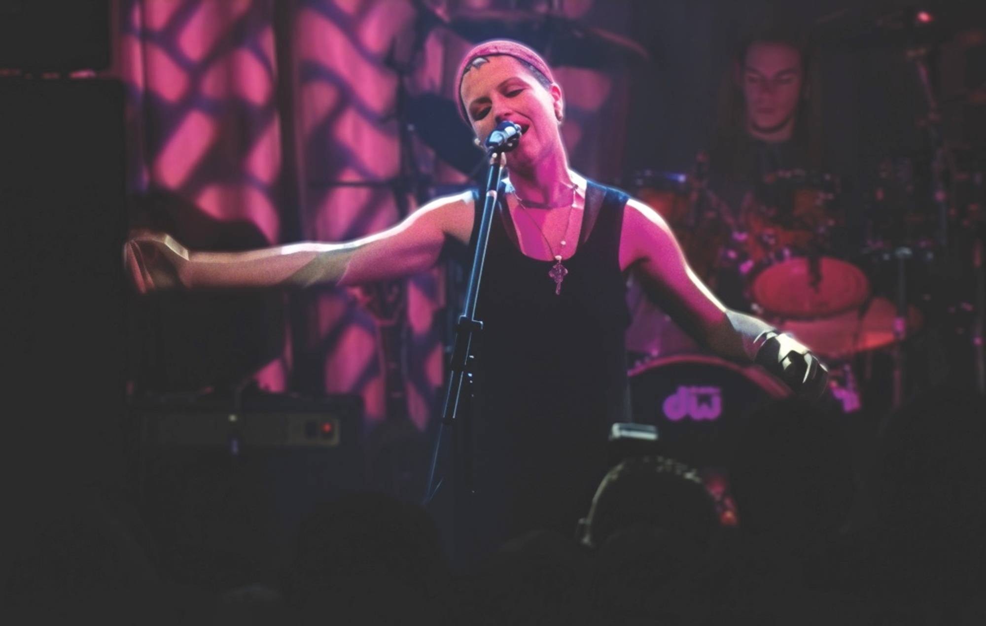 The Cranberries performing live on stage during a concert