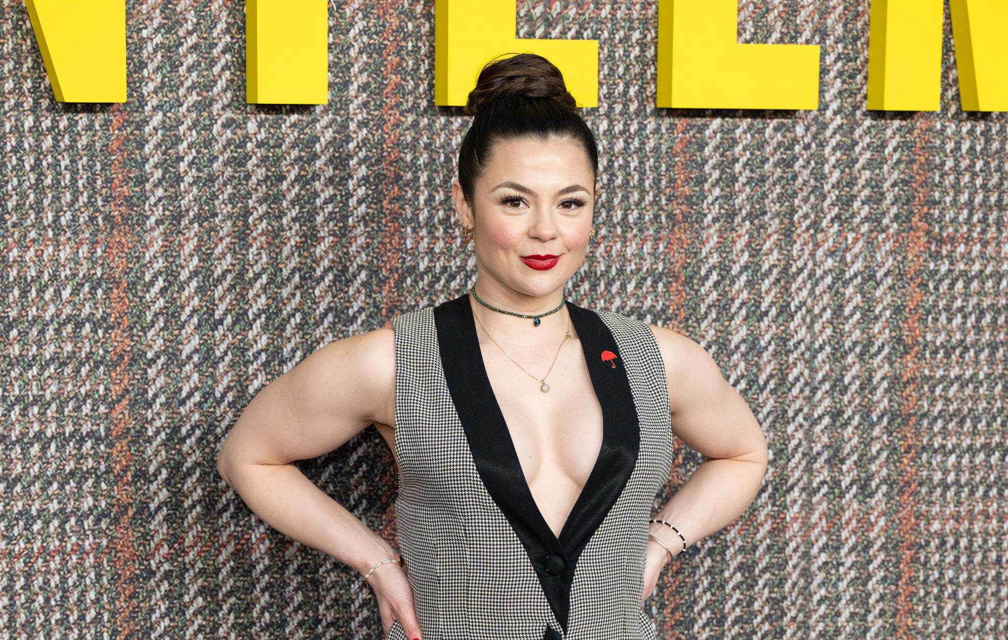 Former Skins actor Megan Prescott posing on a red carpet
