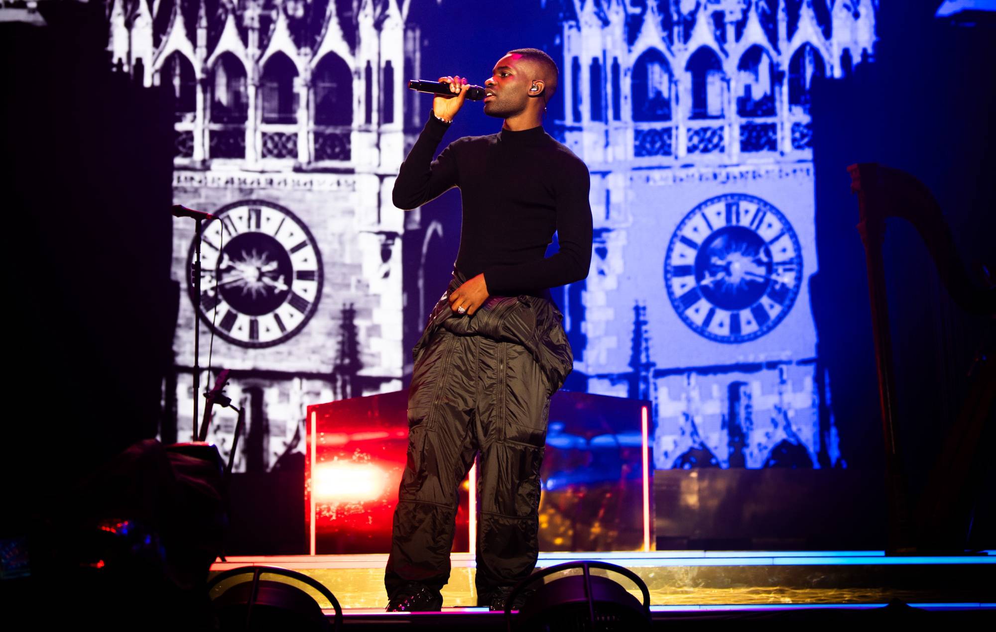 Dave performing on stage during his headline festival set