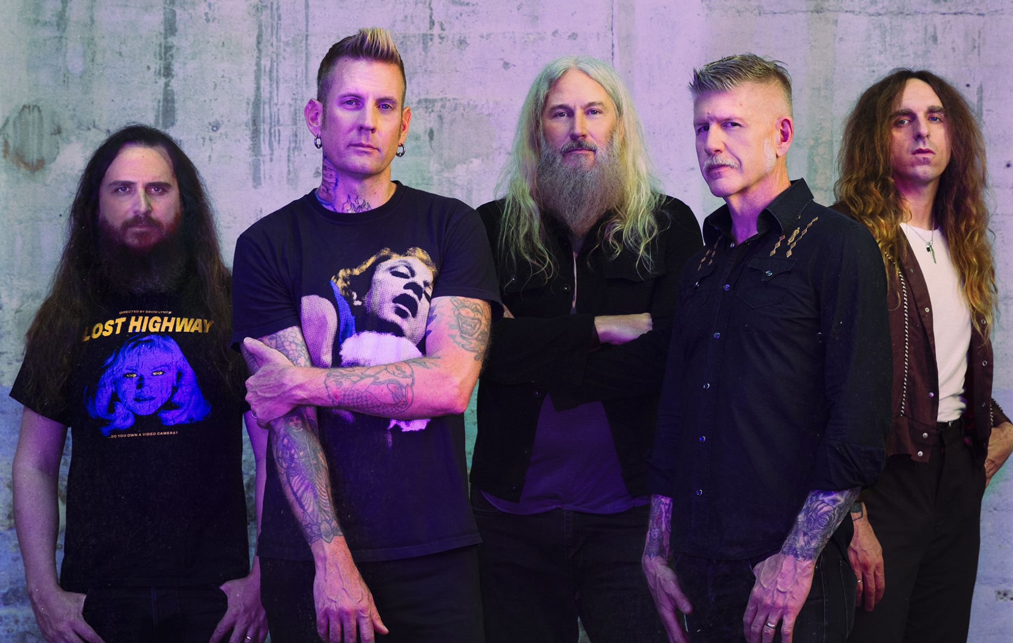 Brann Dailor performing on stage with metal band Mastodon.