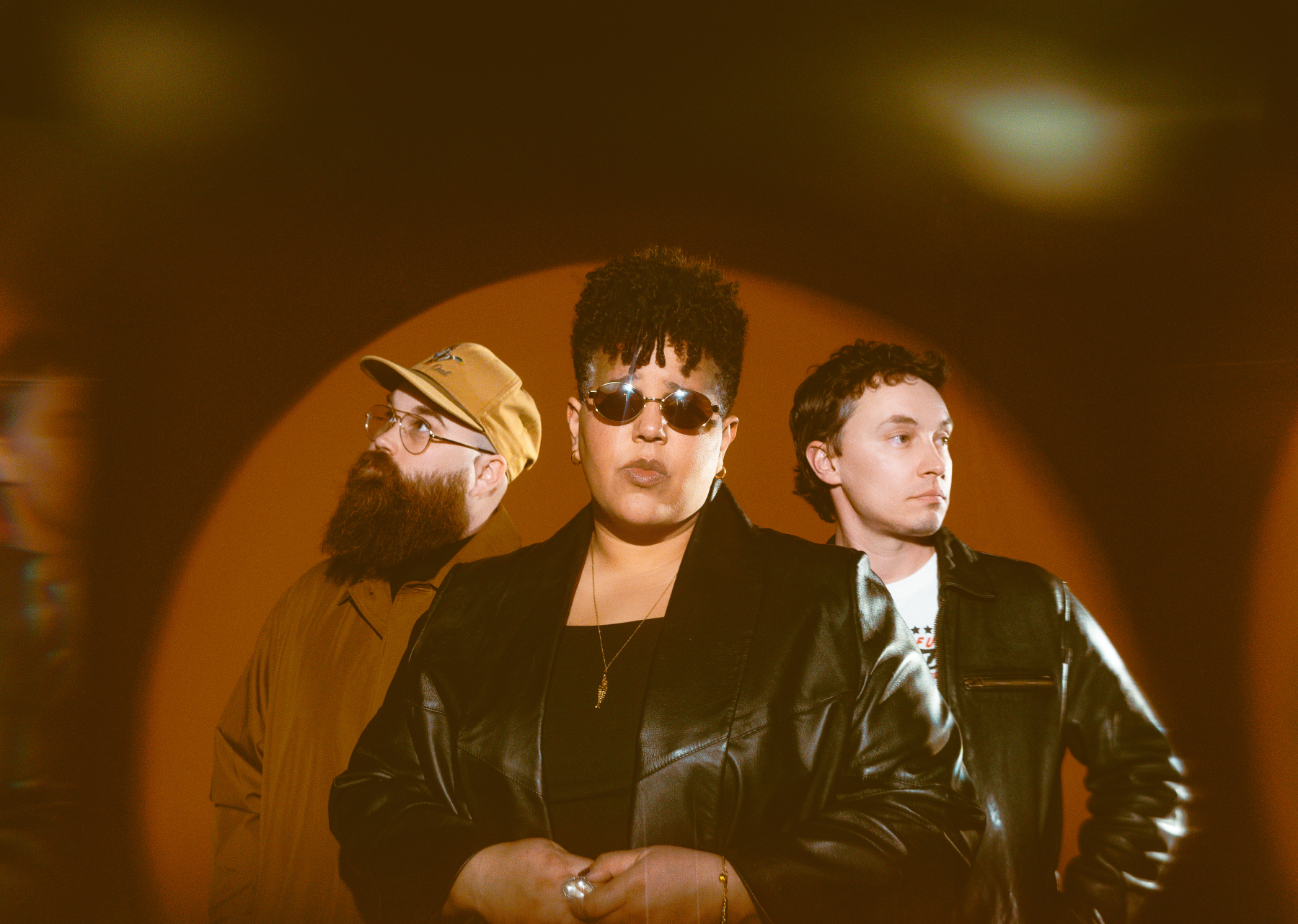 Brittany Howard performing on stage with Alabama Shakes