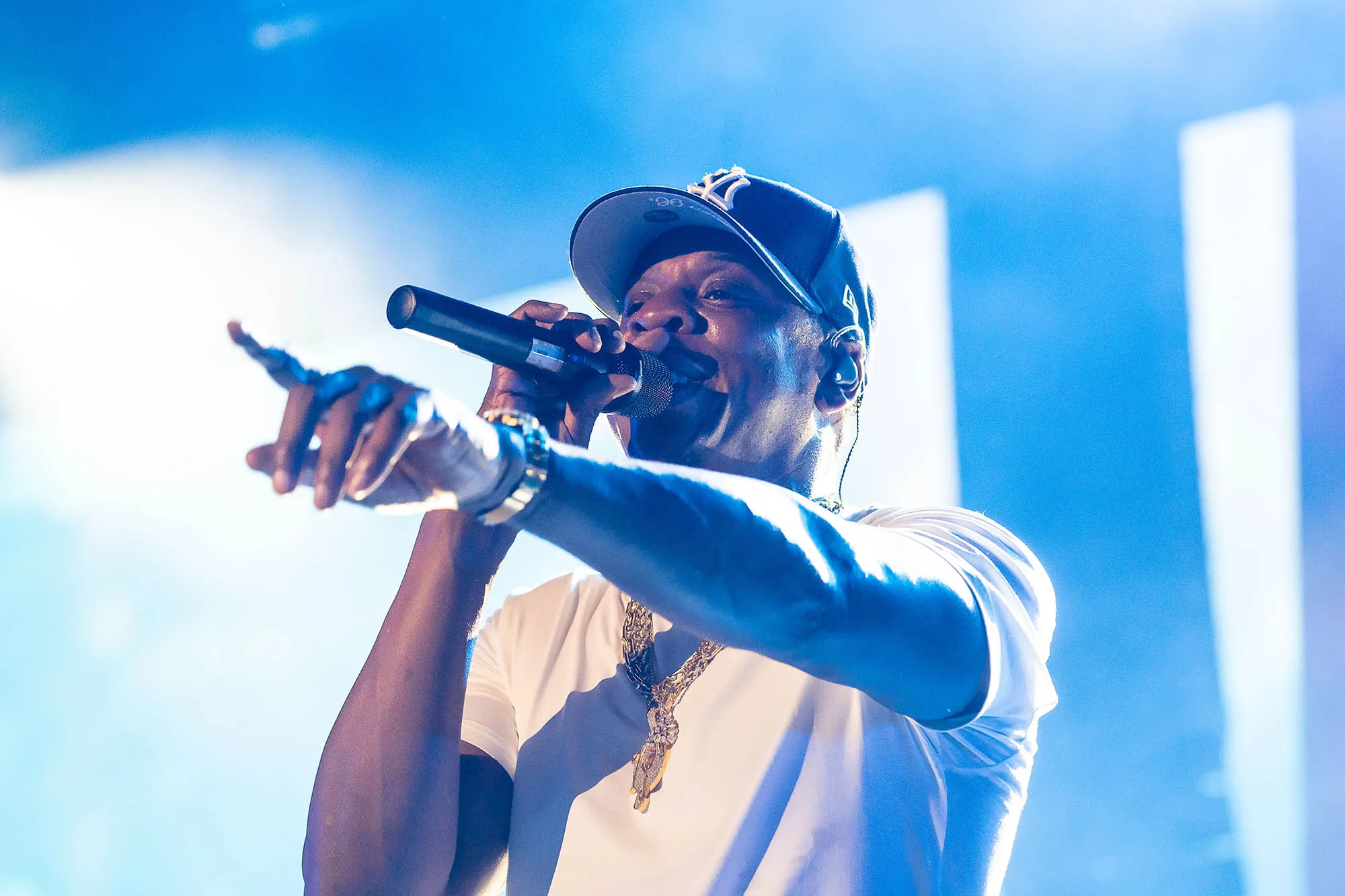 Jay-Z performing on stage during a concert appearance.