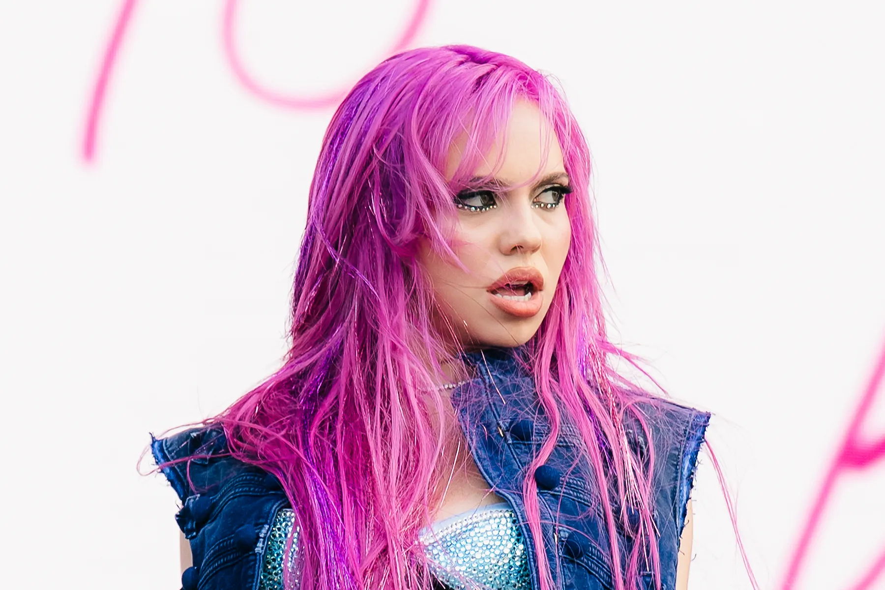 Rising pop singer Adéla smiling during a media interview about her debut music.
