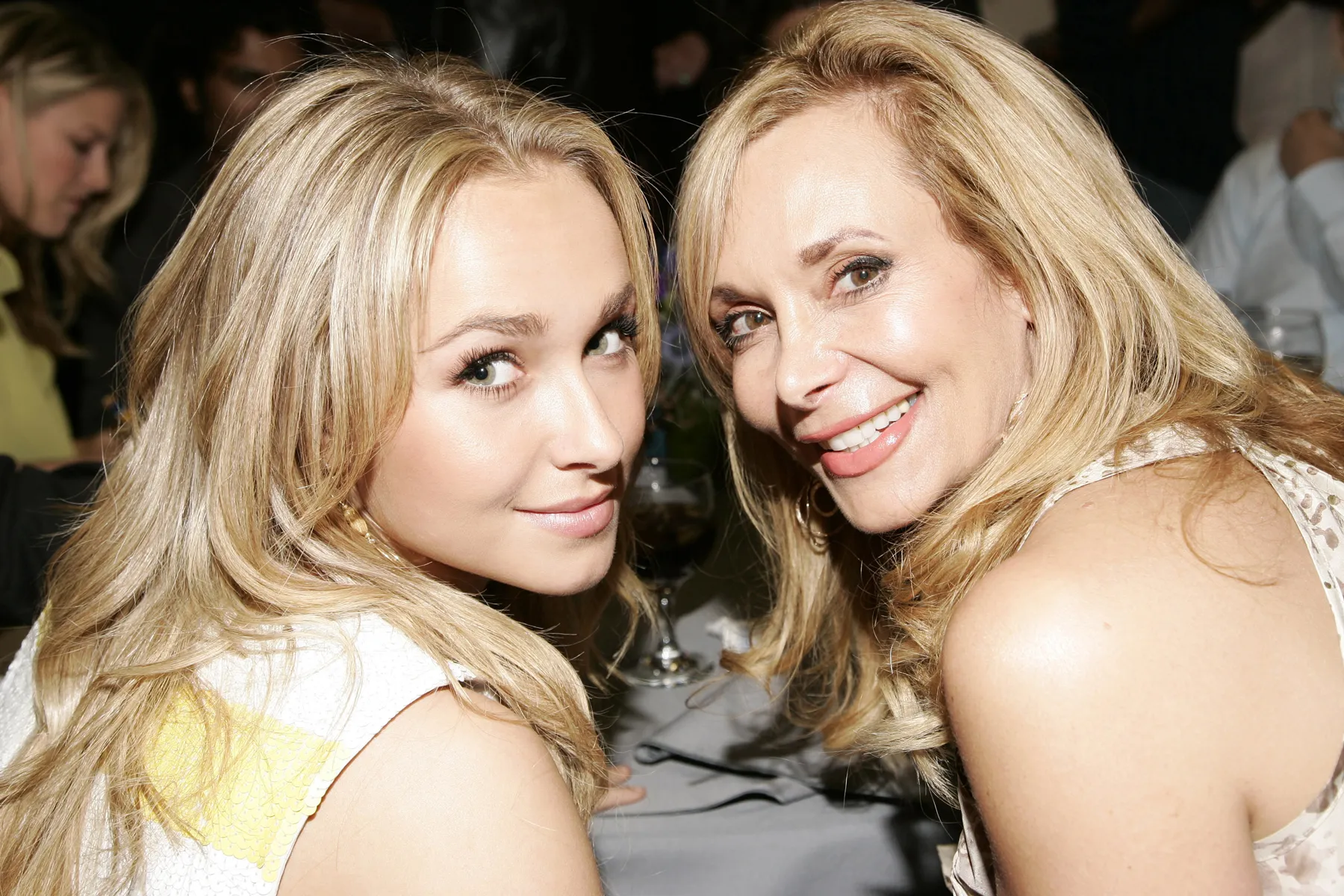 Hayden Panettiere posing on a red carpet at an entertainment event