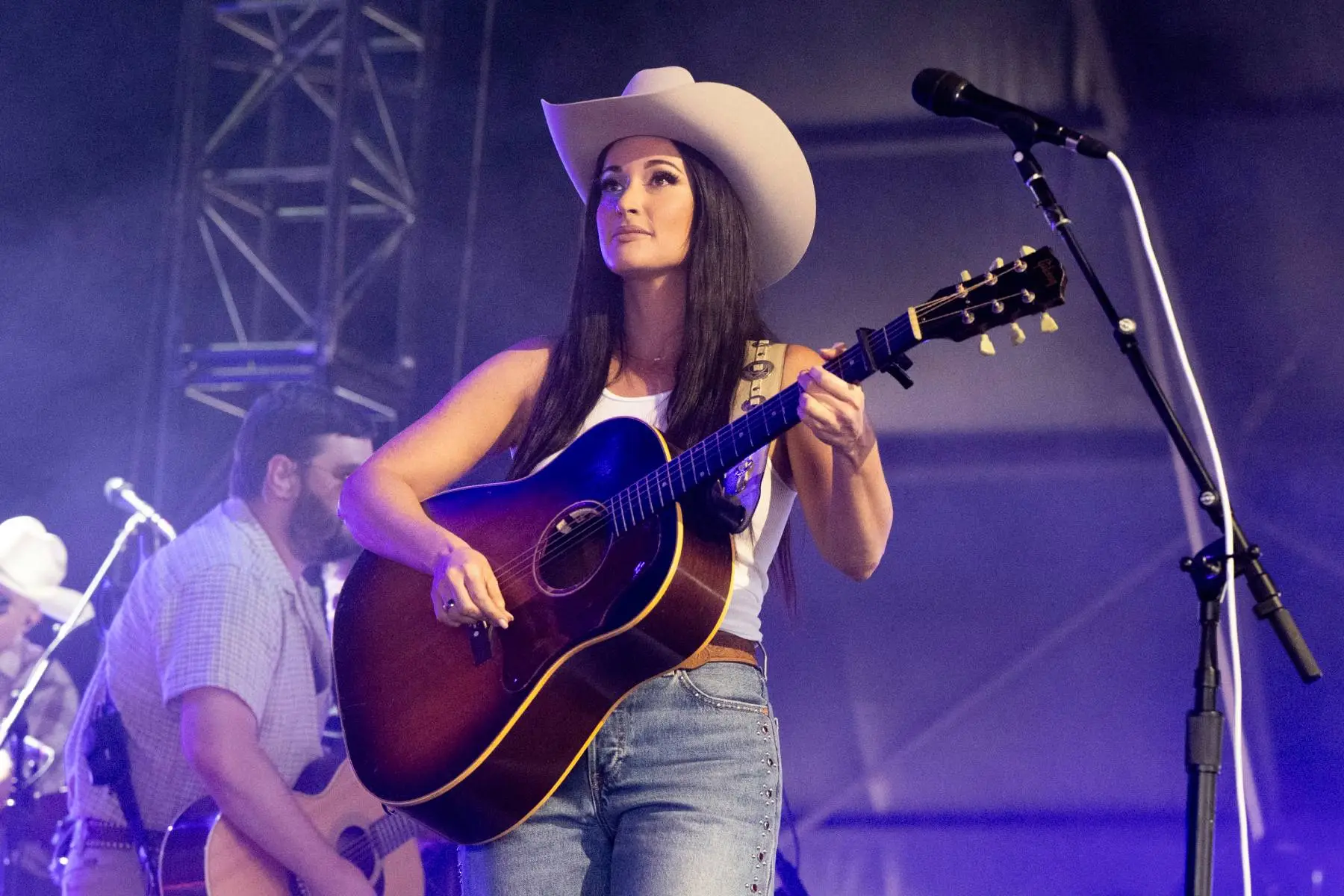 Kacey Musgraves performing on stage during a concert