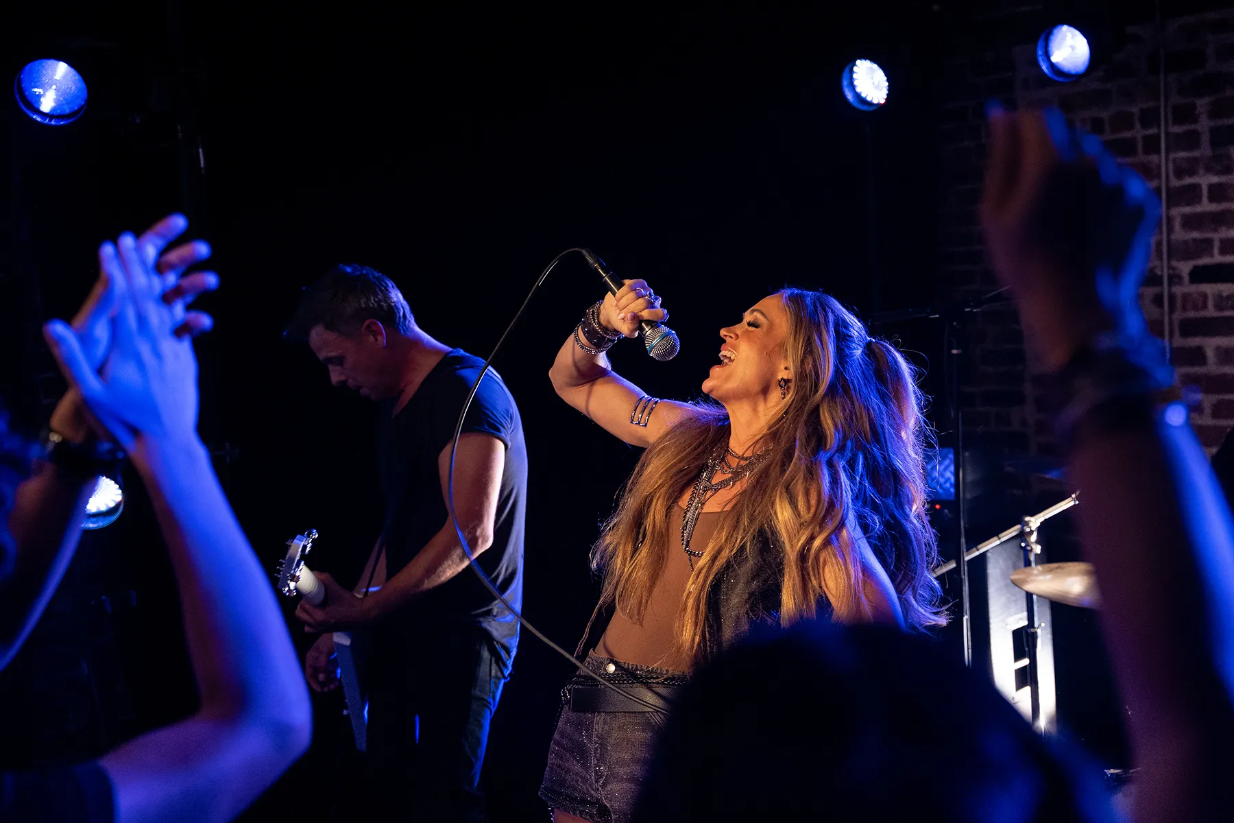 Carrie Underwood performing on stage during a concert