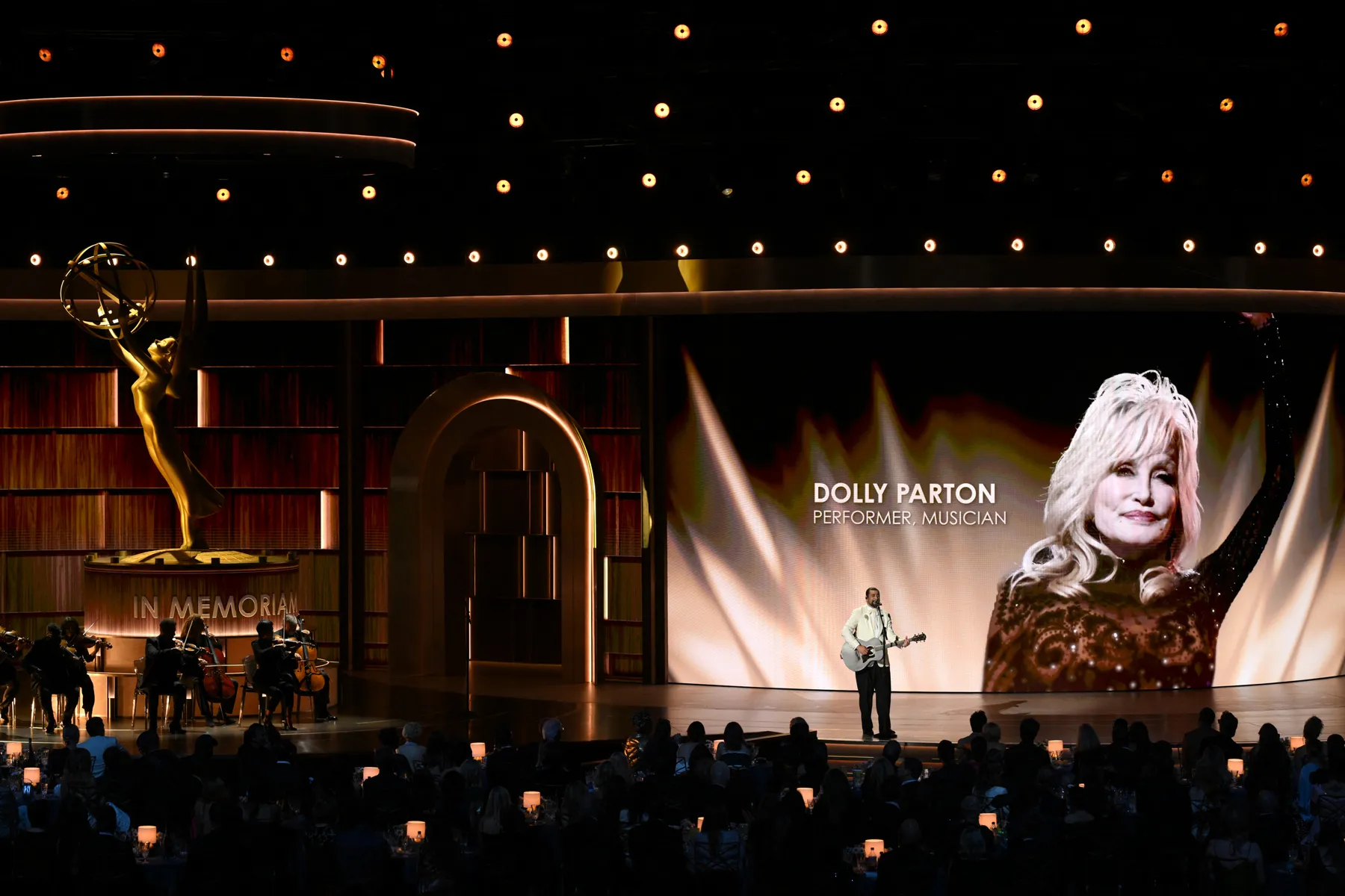 Presenters on stage paying tribute during the Emmy Awards telecast