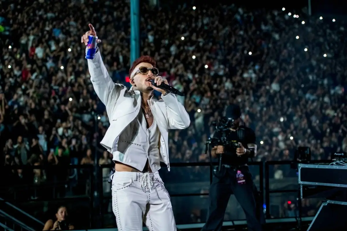 Rauw Alejandro performing live on stage at a concert