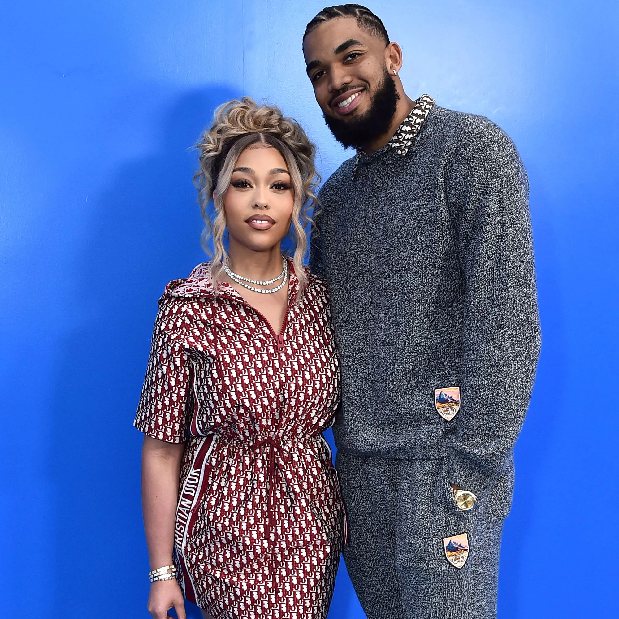 Jordyn Woods and Karl-Anthony Towns posing together at a public event