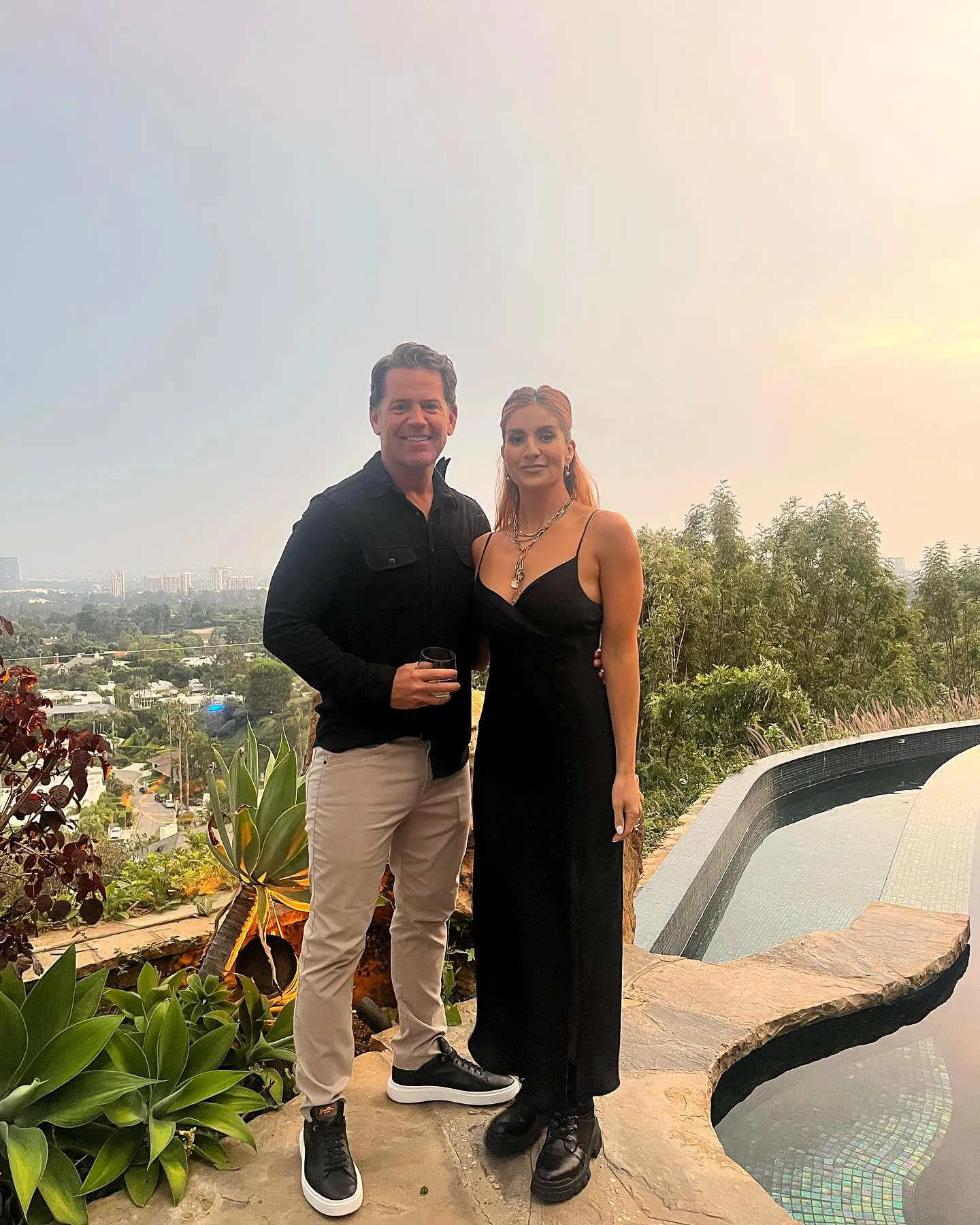 Anneliese van der Pol and Johnno Wilson posing together