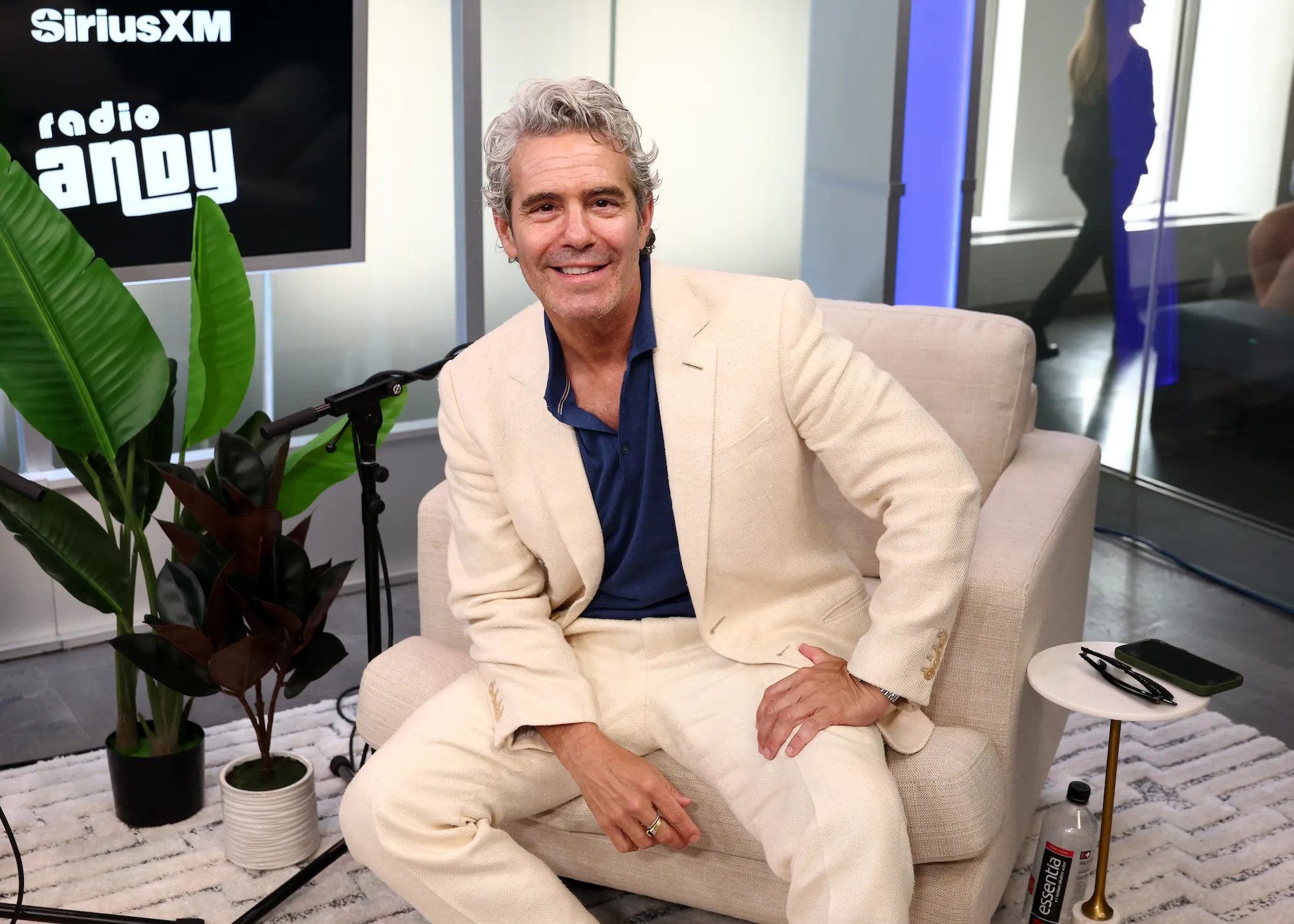 Andy Cohen speaking at a red carpet event