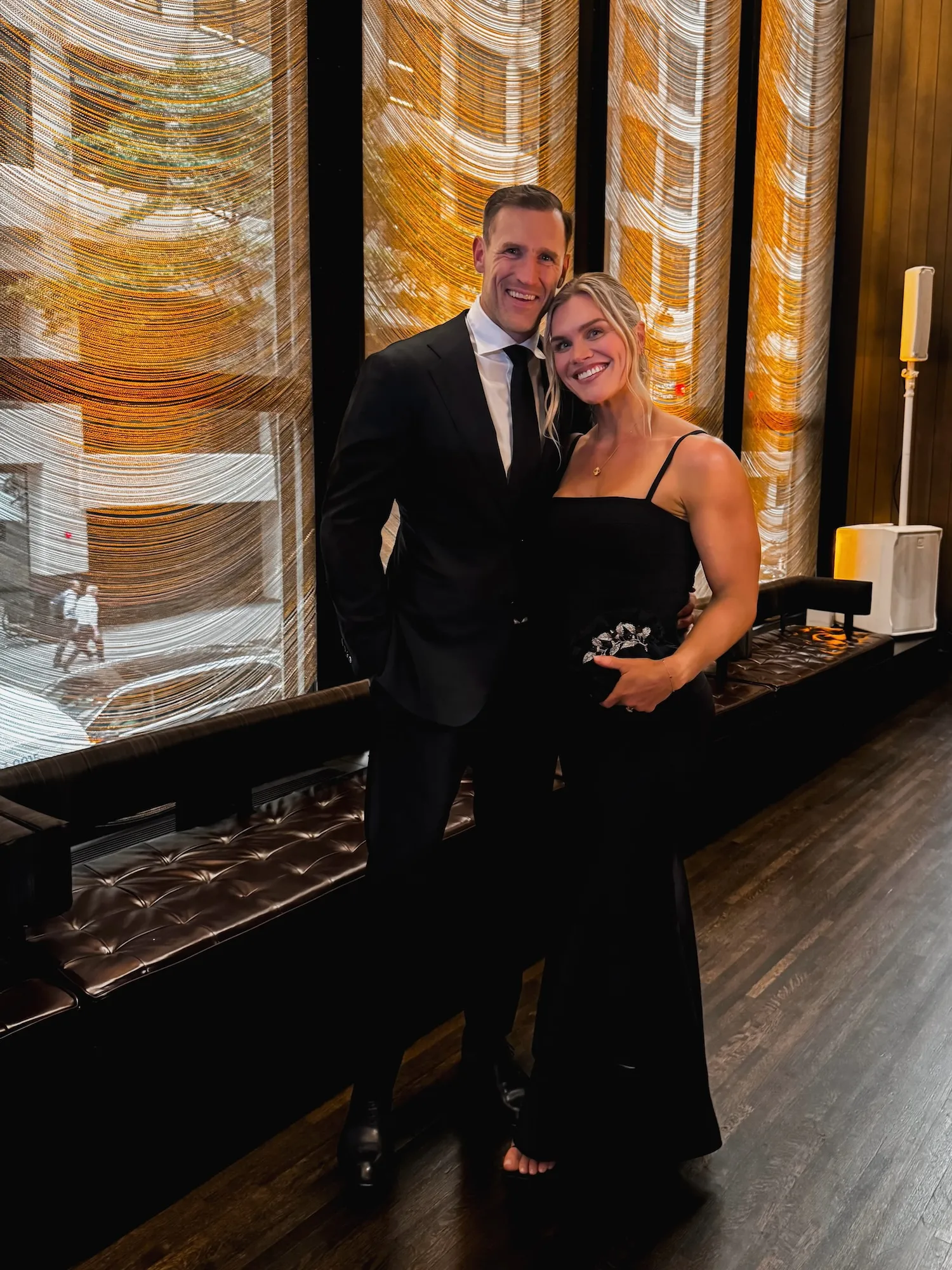 Brooks Laich and Katrín Tanja Davíðsdóttir smile at an event together