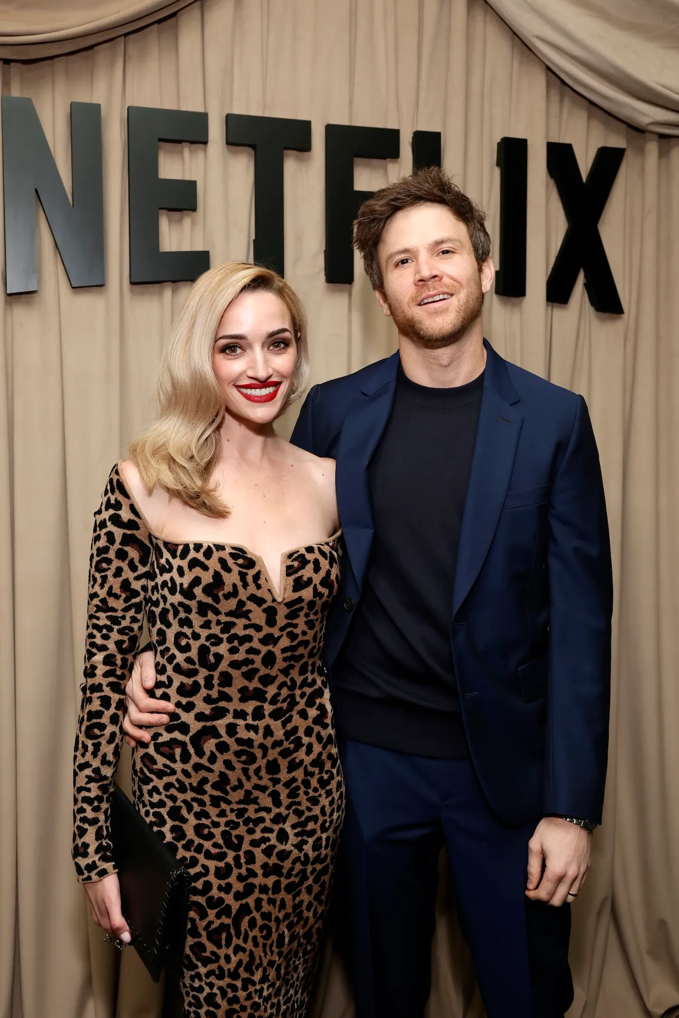 Brianne Howey posing at an entertainment event