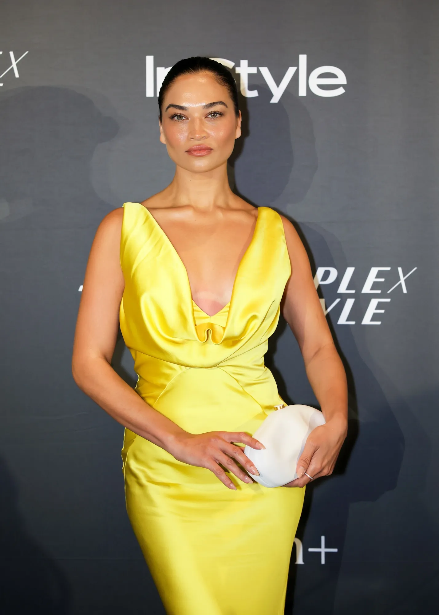 Shanina Shaik posing at an event