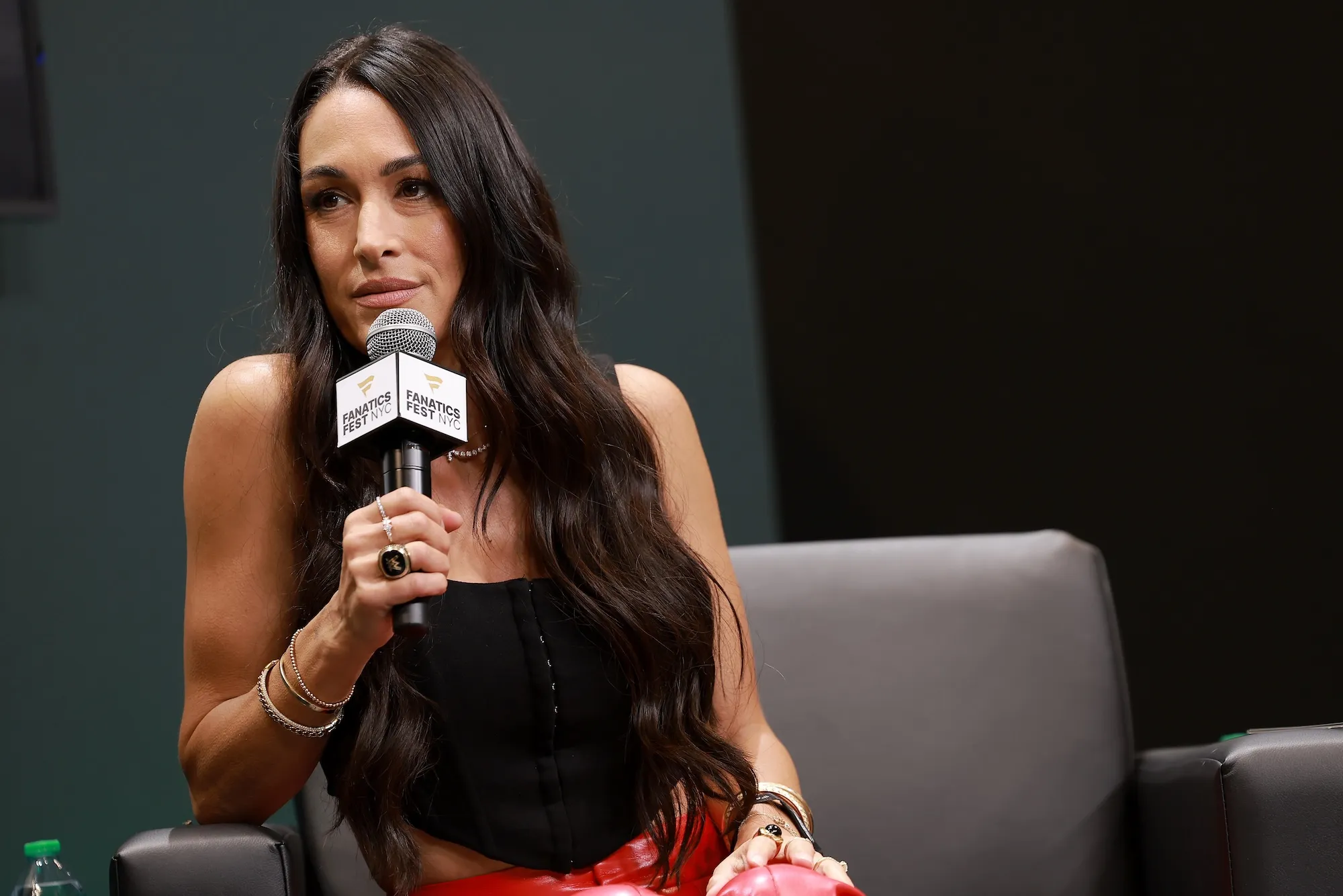 Brie Bella posing on a red carpet