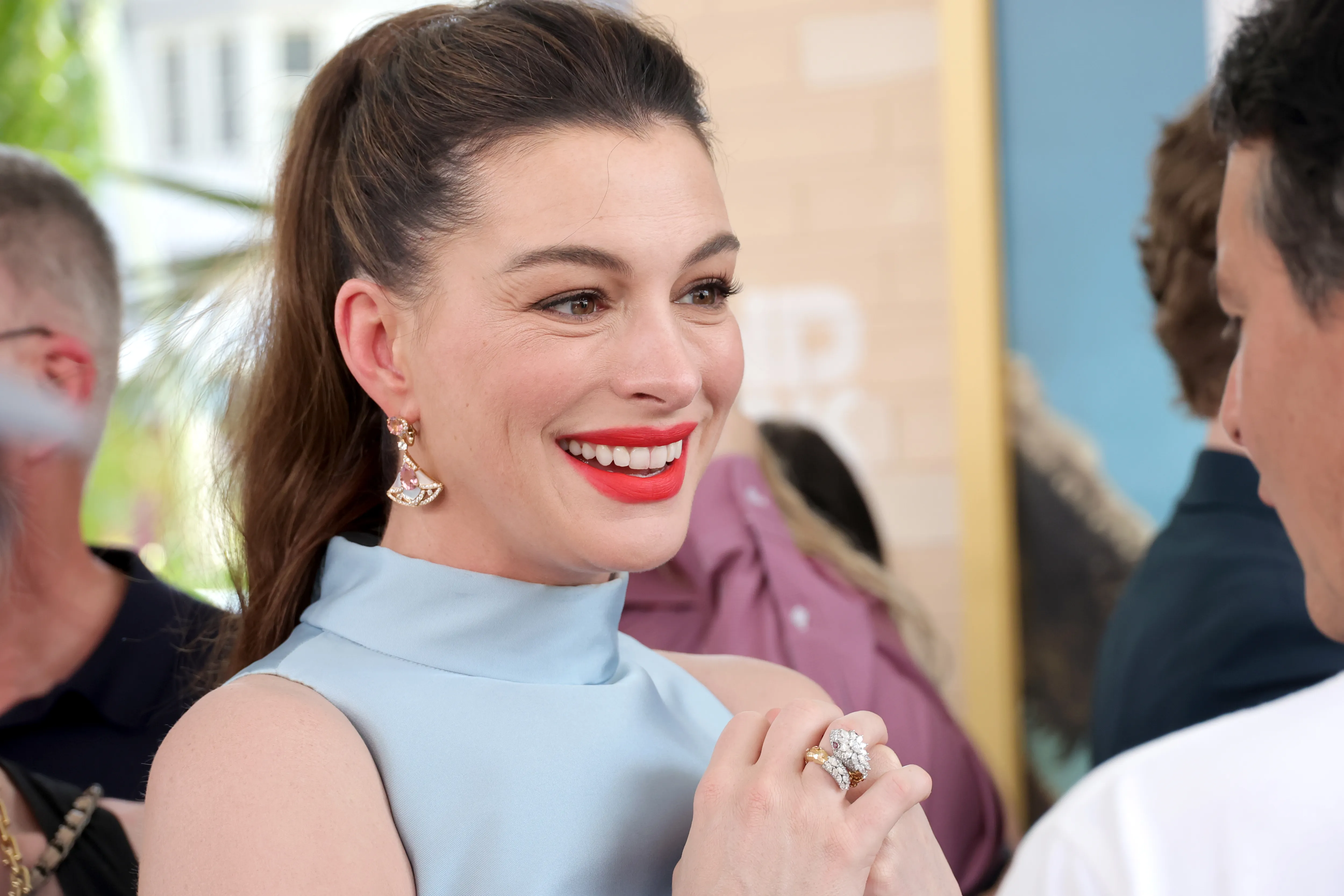 Anne Hathaway showing off her subtle manicure on the red carpet