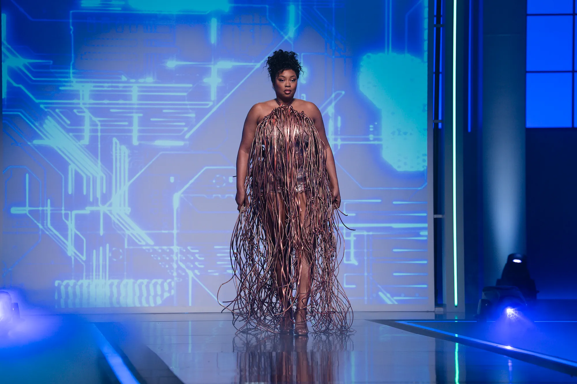 Liris Crosse walks the runway on Project Runway