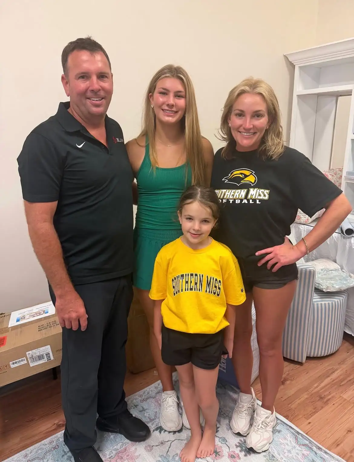 Jamie Lynn Spears posing with her daughters Maddie and Ivey in a college dorm room.