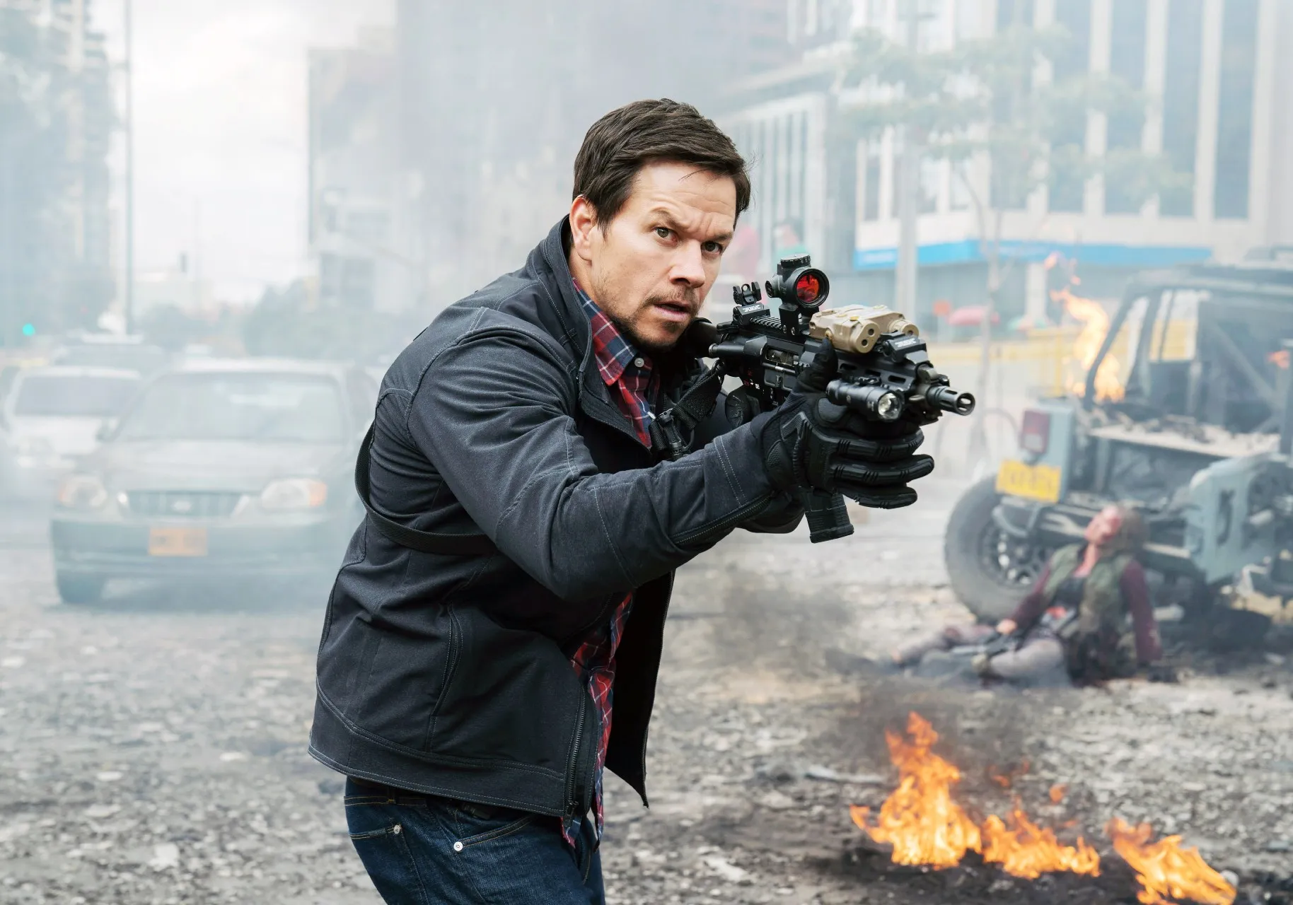 Keanu Reeves, Sandra Bullock, and Mark Wahlberg in action movie stills