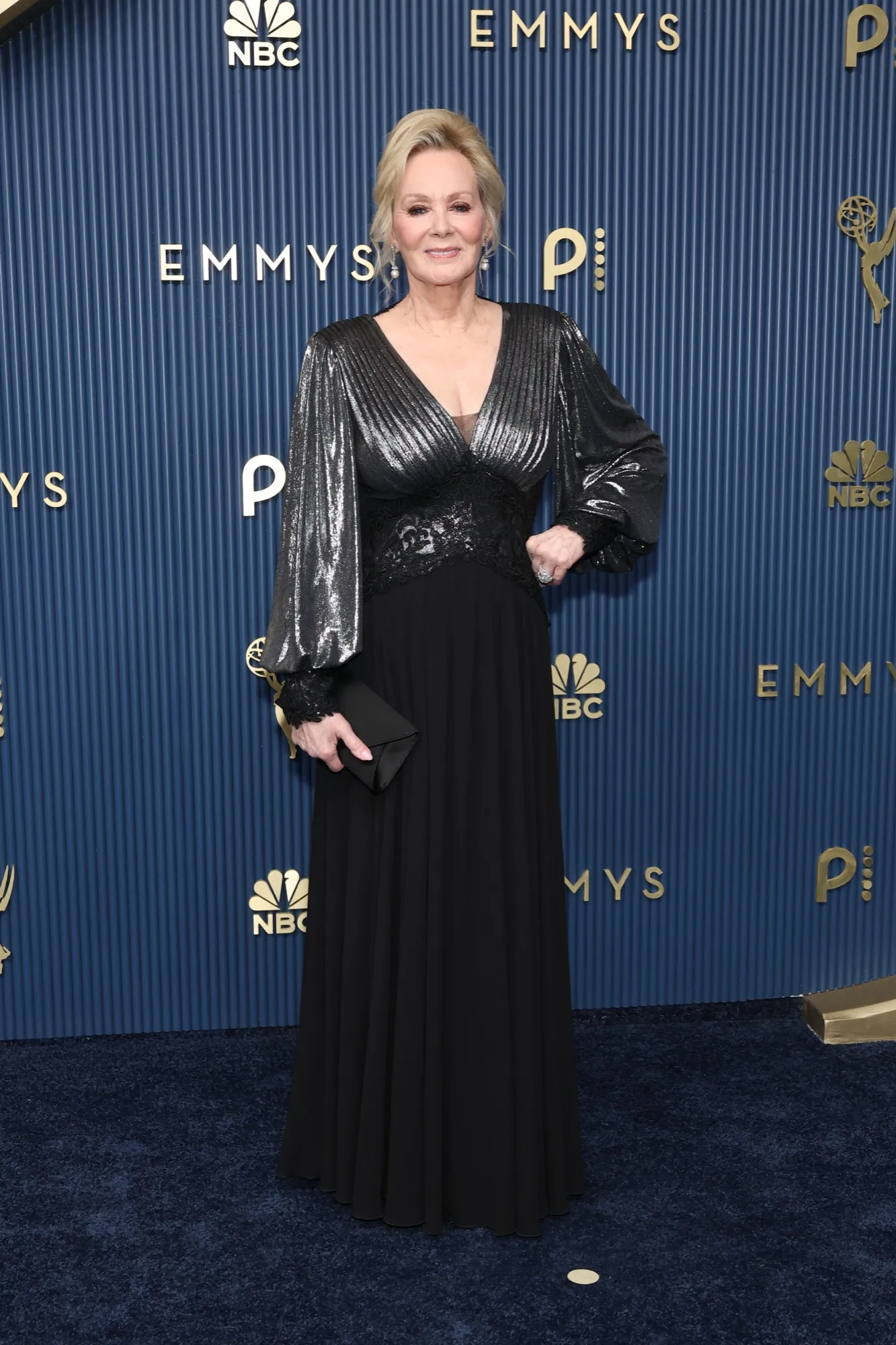 Jean Smart accepting an Emmy Award on stage