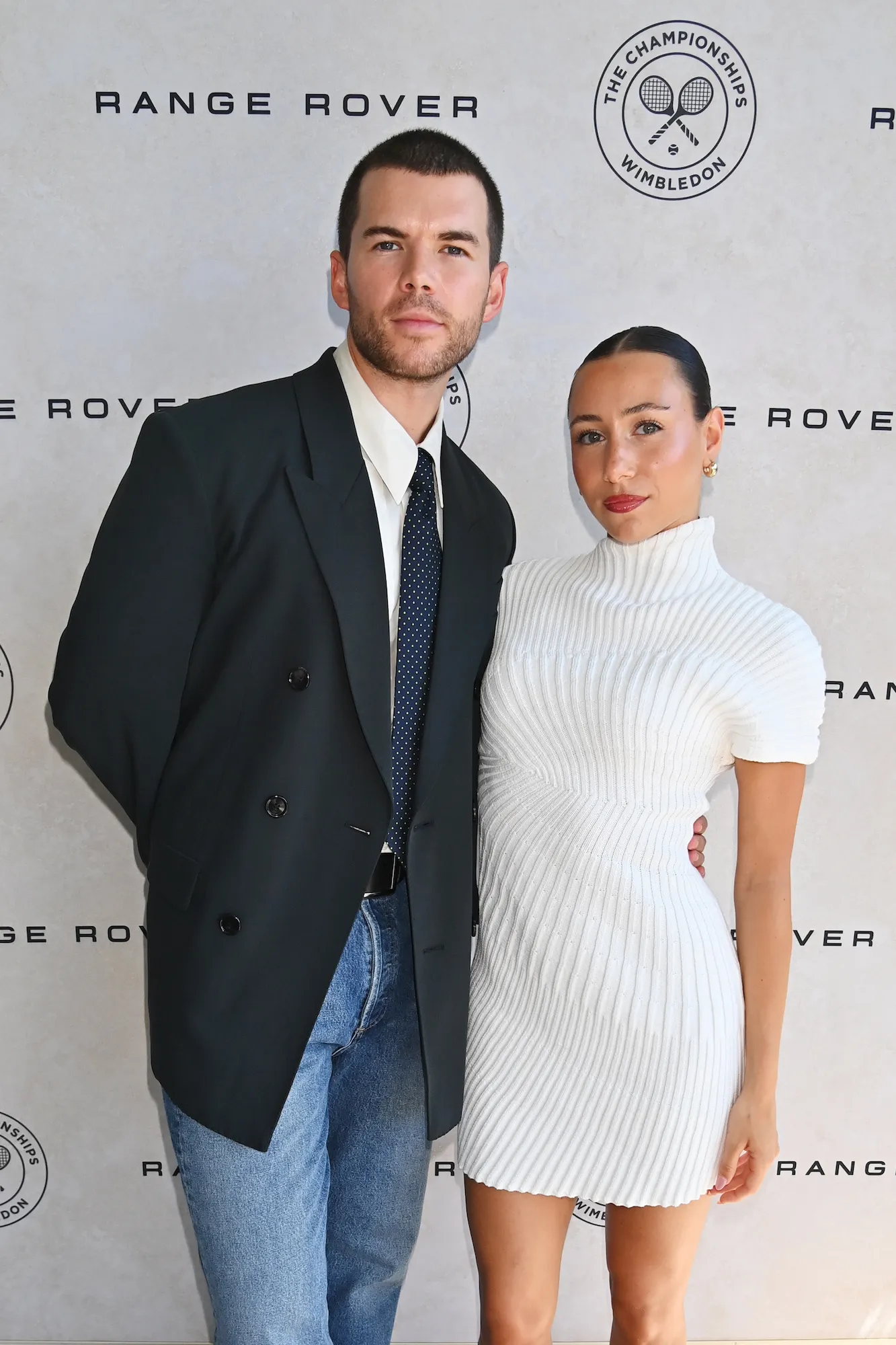 Luke Newton and Antonia Roumelioti attending a red carpet event together