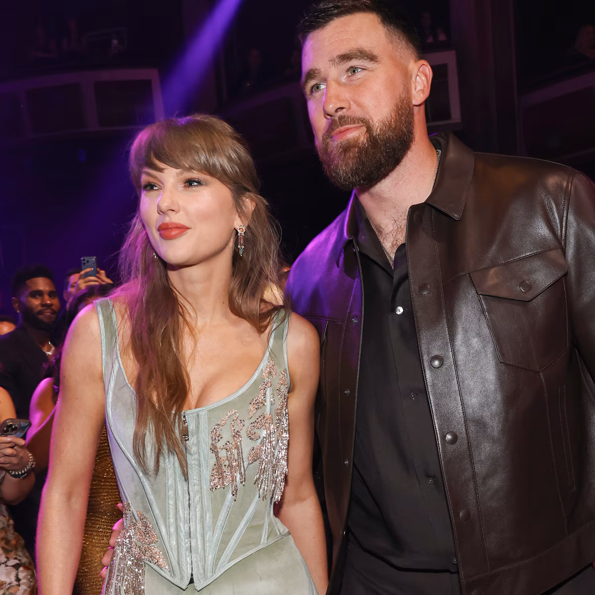 Travis Kelce smiling during an interview about his wedding to Taylor Swift