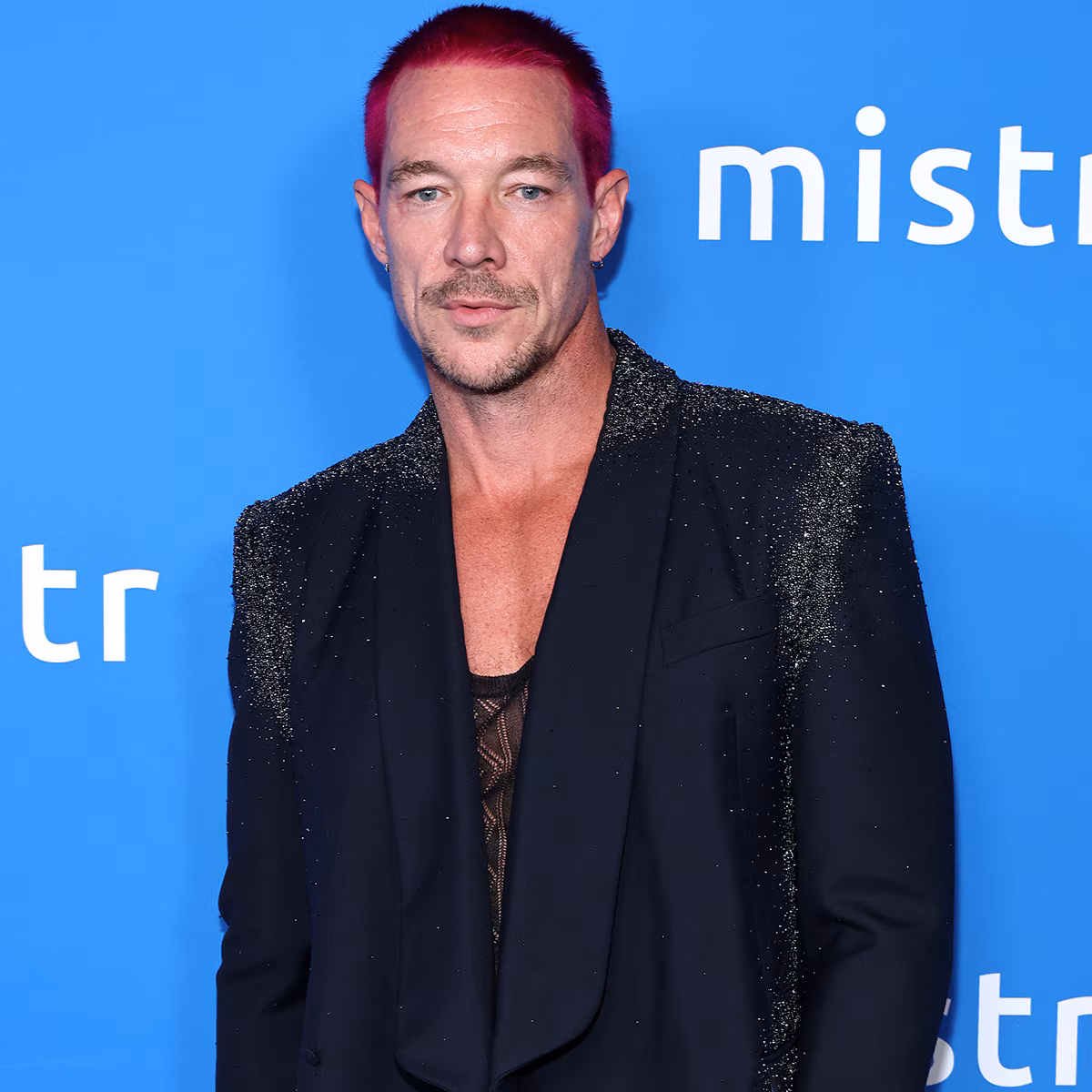 Diplo smiling at an event
