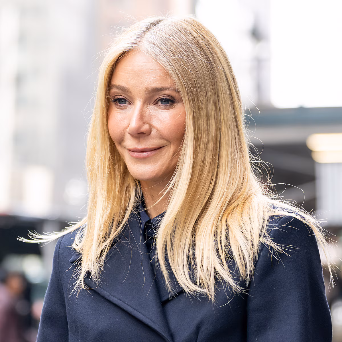 Gwyneth Paltrow and her lookalike daughter Apple Martin posing together in a summer photo