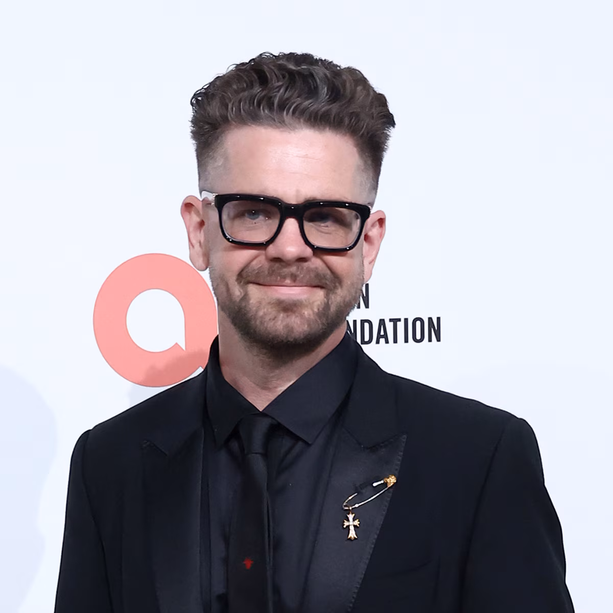 Jack Osbourne and Ozzy Osbourne attending an entertainment event together