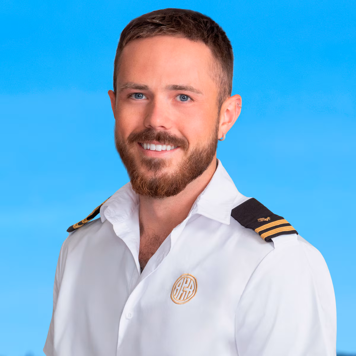 Nathan Gallagher from Below Deck Mediterranean looking directly at the camera.