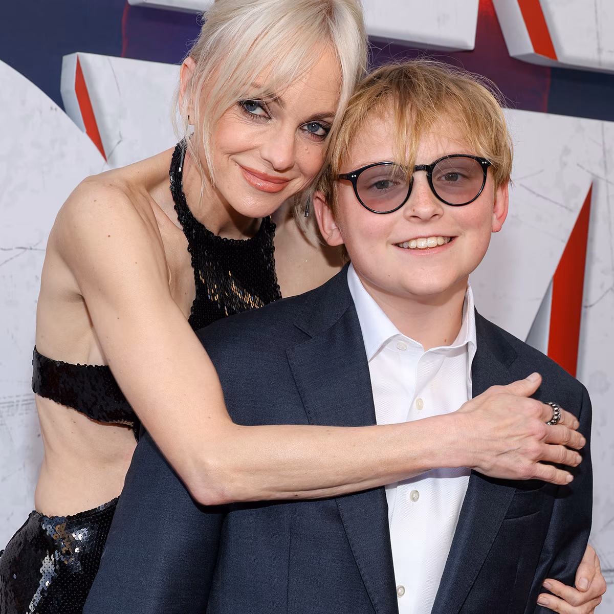 Anna Faris posing on a red carpet at a Hollywood premiere