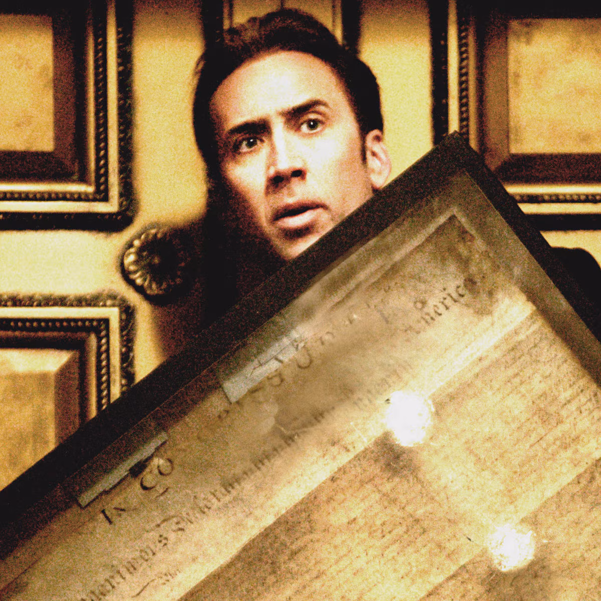Nicolas Cage poses on the red carpet at a movie premiere