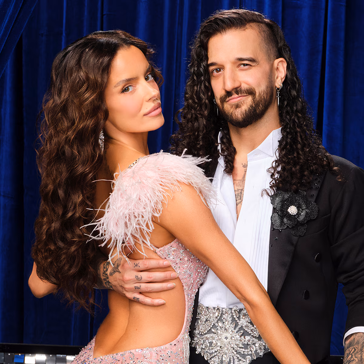 Maura Higgins and Mark Ballas striking a posture during ballroom rehearsals.
