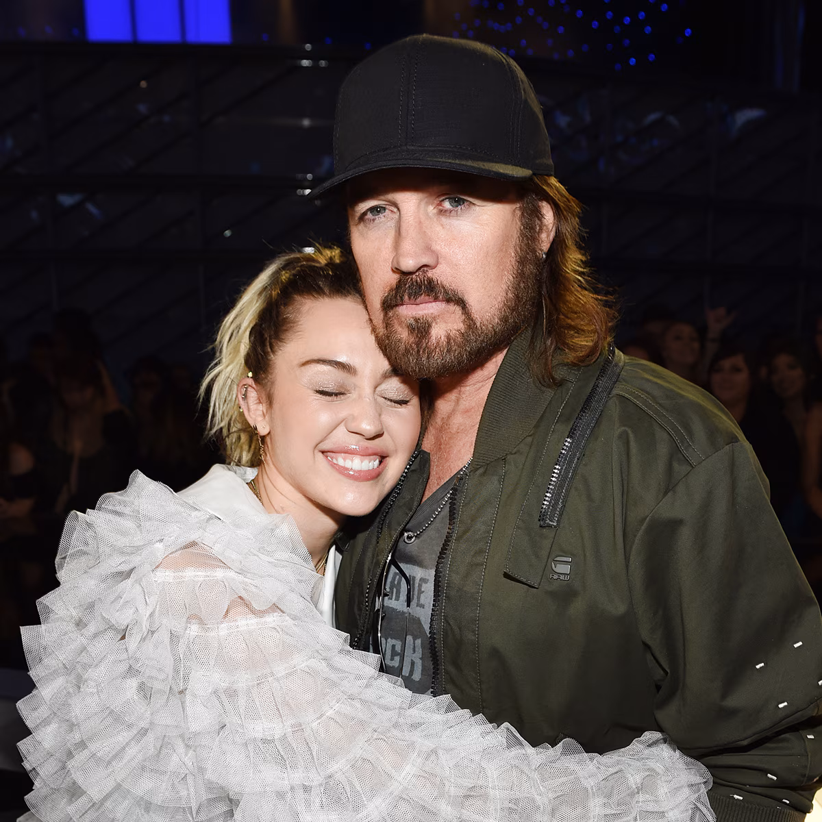 Miley Cyrus and Shiloh Jolie posing at red carpet events
