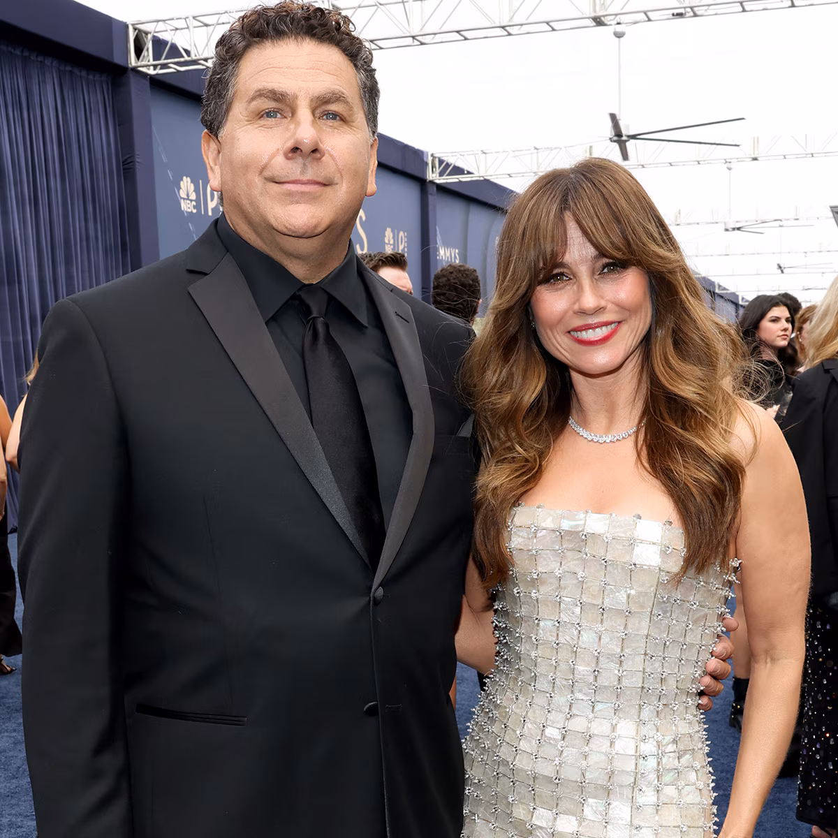 Linda Cardellini posing at the 2026 Emmy Awards red carpet
