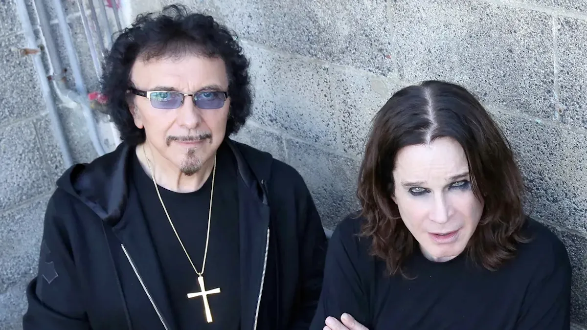 Black Sabbath bandmates Tony Iommi and Ozzy Osbourne performing together on stage.